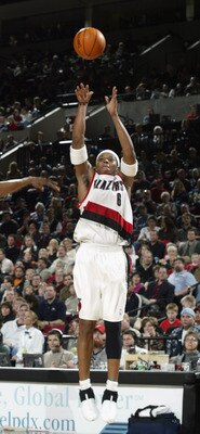 PORTLAND - DECEMBER 17:  Bonzi Wells #6 of the Portland Trail Blazers shoots a jumpshot during the game against the New Orleans Hornets at Rose Garden on December 17, 2002 in Portland, Oregon.  The Trail Blazers won 102-93.  NOTE TO USER: User expressly a
