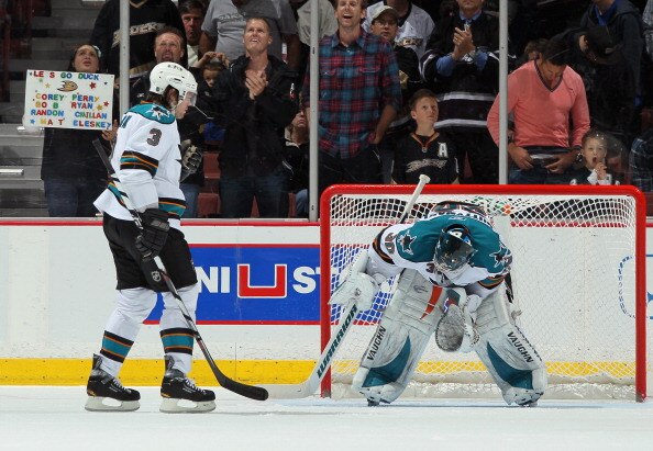 ANAHEIM, CA - APRIL 06:  Goaltender Antero Niittymaki #30 of the San Jose Sharks looks down after giving up a second period goal to Teemu Selanne (not pictured) of the Anaheim Ducks, as Douglas Murray #3 of the Sharks skates by at Honda Center on April 6,