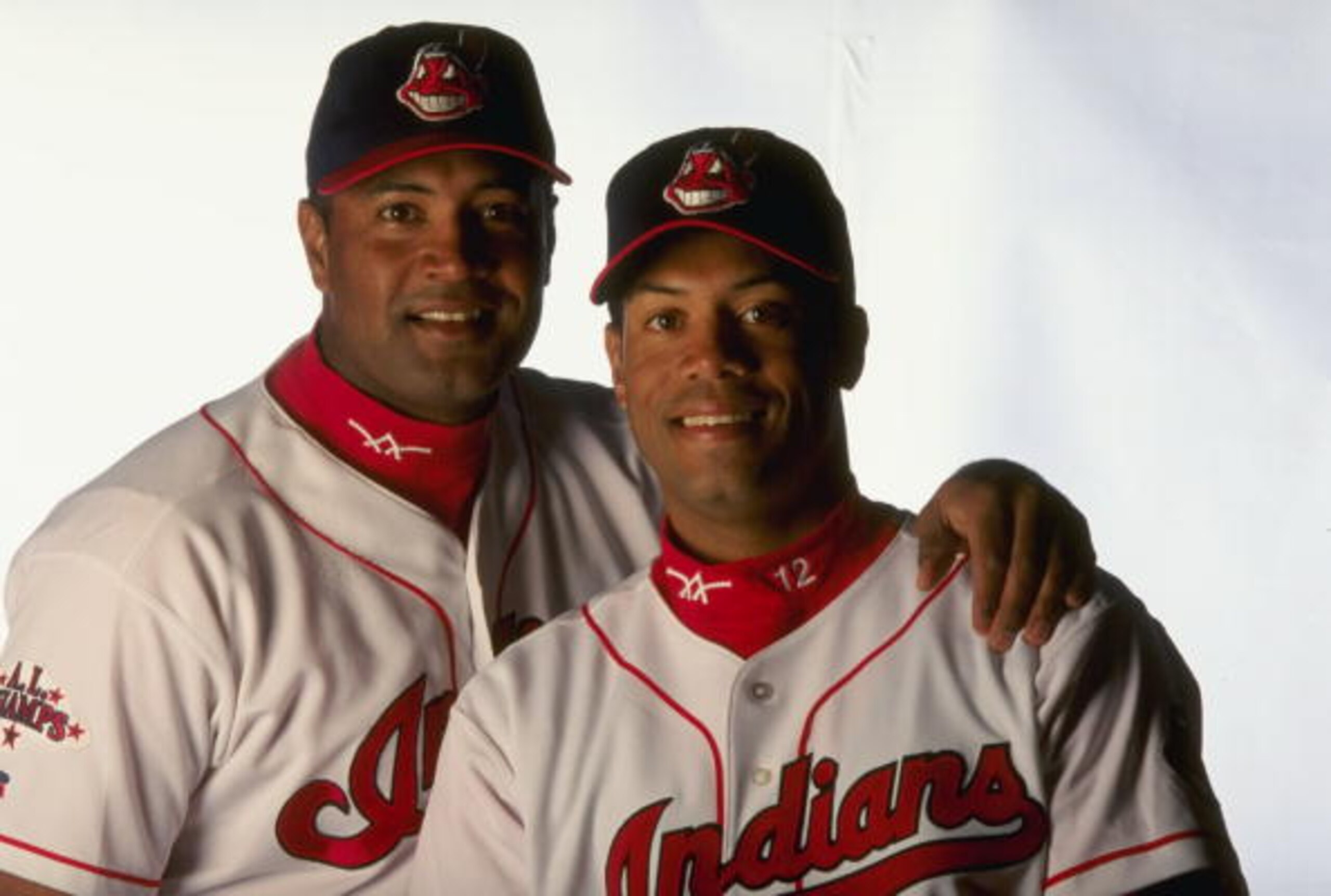 4 Mar 1999:  Catcher Sandy Alomar #15 and Infielder Roberto Alomar #12 of the Cleveland Indians pose together for a studio portrait on Photo Day during Spring Training at the Chain of Lakes Park in Winter Haven, Florida. Mandatory Credit: Vincent Laforet