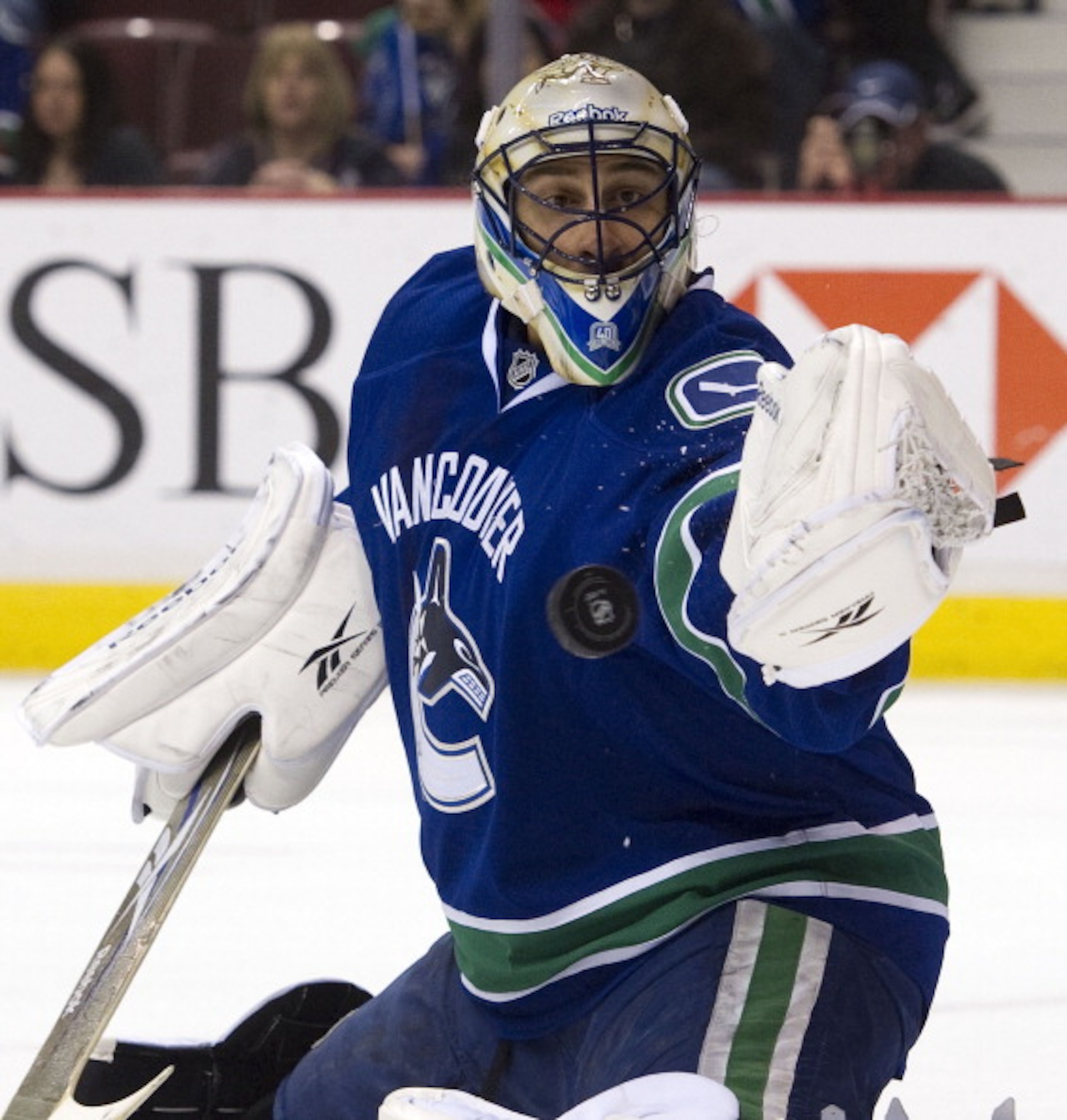 VANCOUVER, CANADA - MARCH 3: Goalie Roberto Luongo #1 of the Vancouver Canucks makes a glove save against the Nashville Predators during the first period in NHL action on March 03, 2011 at Rogers Arena in Vancouver, British Columbia, Canada. (Photo by Ri VANCOUVER, CANADA - MARCH 3: Goalie Roberto Luongo #1 of the Vancouver Canucks makes a glove save against the Nashville Predators during the first period in NHL action on March 03, 2011 at Rogers Arena in Vancouver, British Columbia, Canada. (Photo by Ri