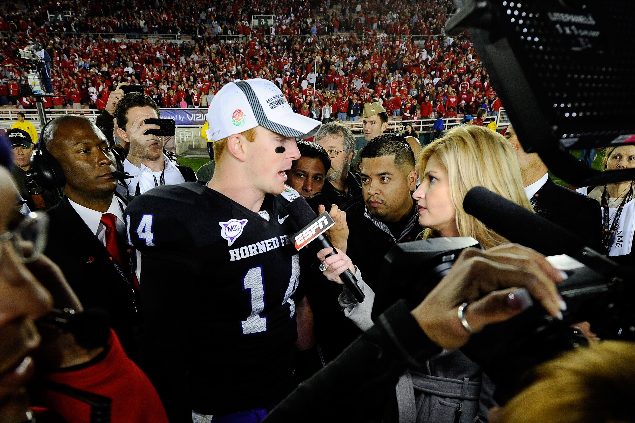 PASADENA, CA - JANUARY 01: Quarterback Andy Dalton #14 of the TCU Horned Frogs is interviewed by reporter Erin Andrews after defeating the Wisconsin Badgers 21-19 in the 97th Rose Bowl game on January 1, 2011 in Pasadena, California. (Photo by Kevork Dj PASADENA, CA - JANUARY 01: Quarterback Andy Dalton #14 of the TCU Horned Frogs is interviewed by reporter Erin Andrews after defeating the Wisconsin Badgers 21-19 in the 97th Rose Bowl game on January 1, 2011 in Pasadena, California. (Photo by Kevork Dj