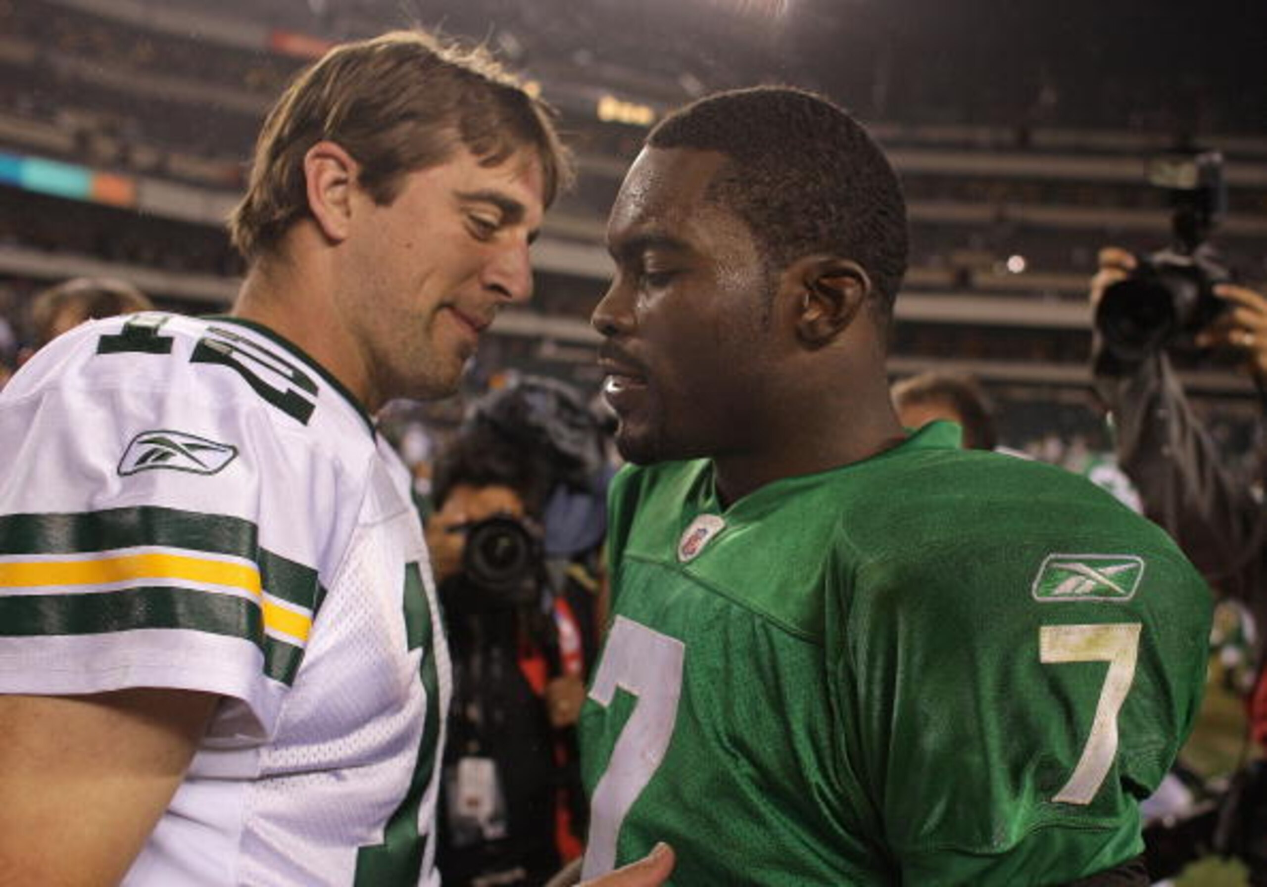 PHILADELPHIA - SEPTEMBER 12: Michael Vick #7 of the Philadelphia Eagles walks off the field and greets Aaron Rodgers #12 after a loss in a game against the Green Bay Packers at Lincoln Financial Field on September 12, 2010 in Philadelphia, Pennsylvania. PHILADELPHIA - SEPTEMBER 12: Michael Vick #7 of the Philadelphia Eagles walks off the field and greets Aaron Rodgers #12 after a loss in a game against the Green Bay Packers at Lincoln Financial Field on September 12, 2010 in Philadelphia, Pennsylvania.