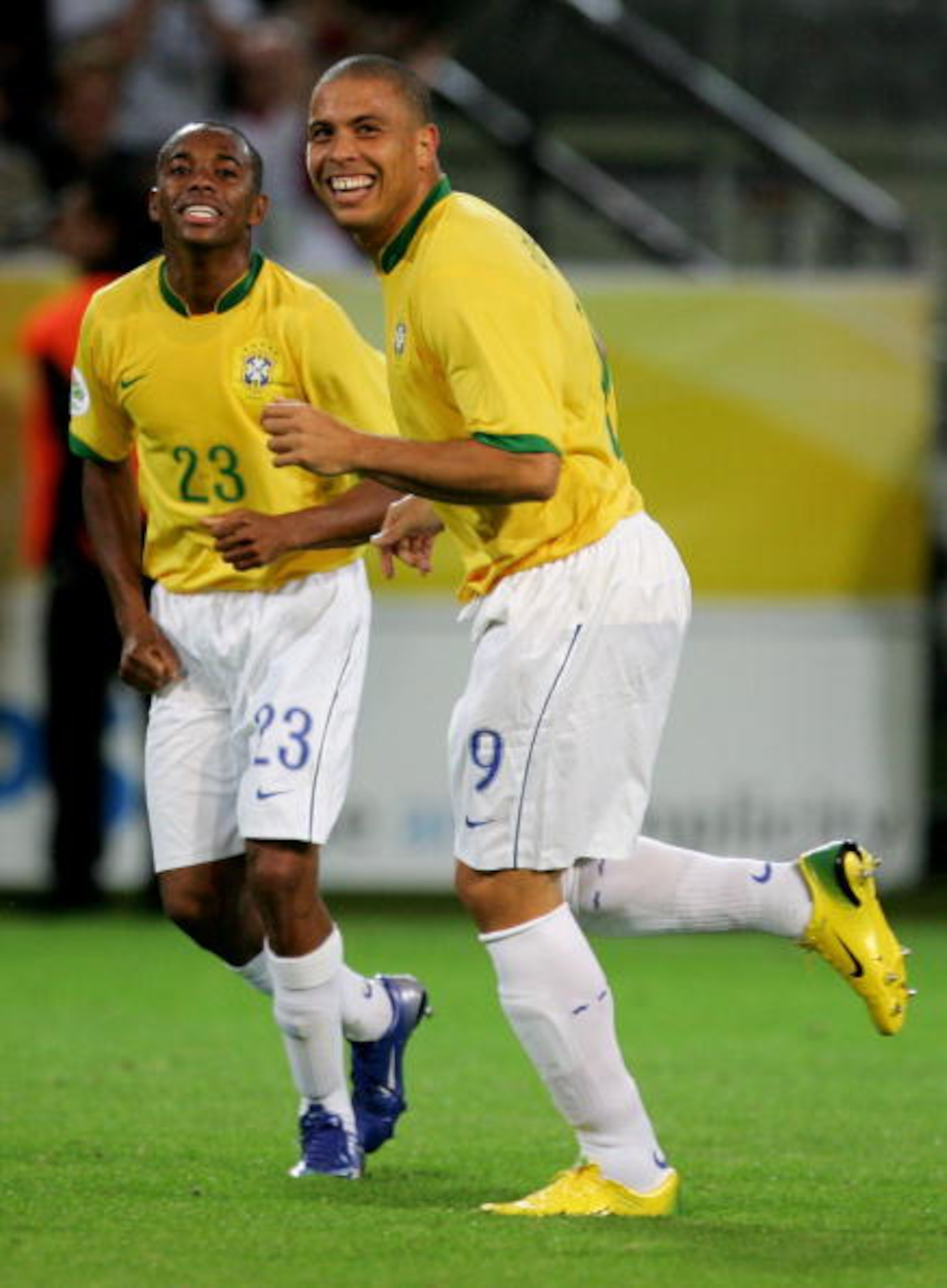 DORTMUND, GERMANY - JUNE 22:  Ronaldo of Brazil is congratulated celebrates scoring his second goal and his teams fourth during the FIFA World Cup Germany 2006 Group F match between Japan and Brazil at the Stadium Dortmund on June 22, 2006 in Dortmund, Ge