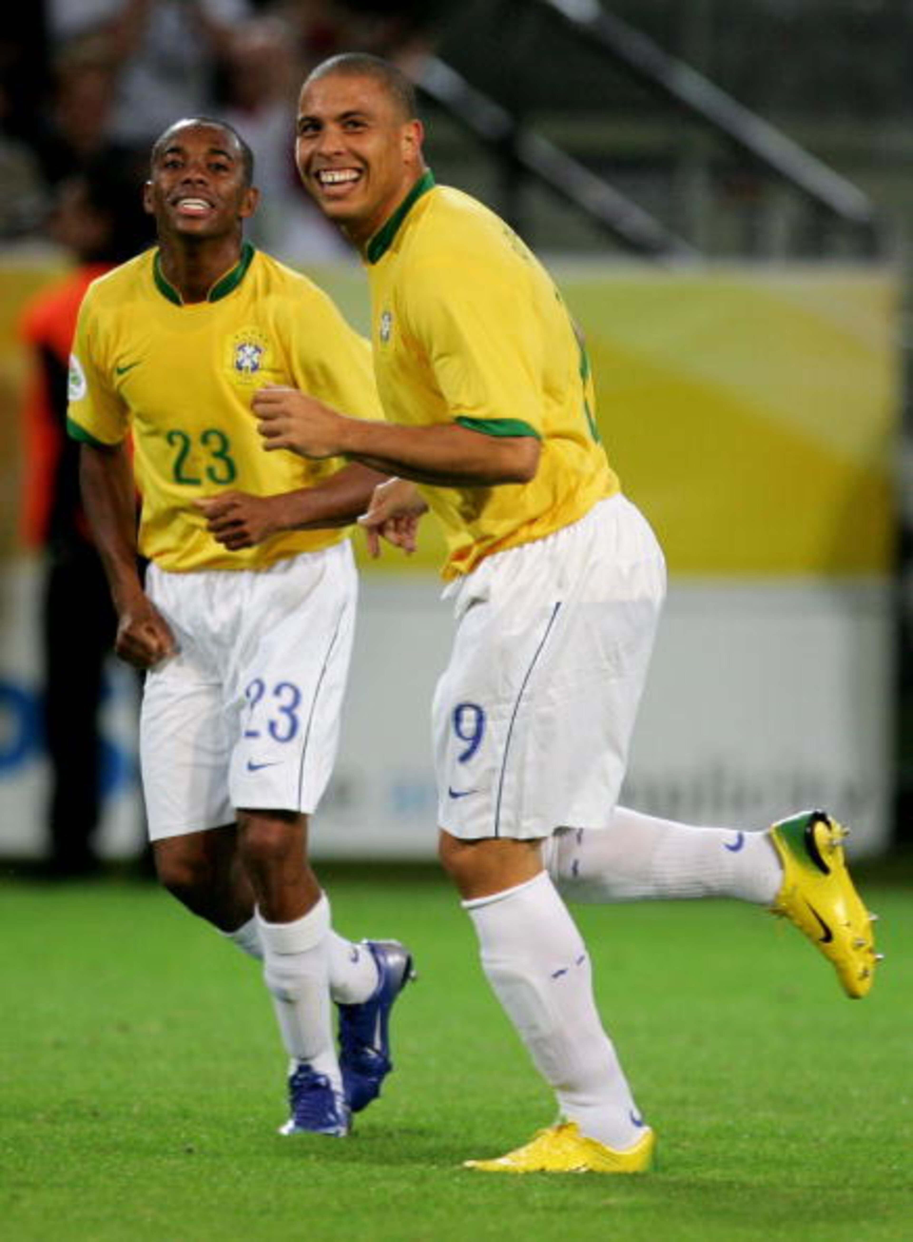 DORTMUND, GERMANY - JUNE 22:  Ronaldo of Brazil is congratulated celebrates scoring his second goal and his teams fourth during the FIFA World Cup Germany 2006 Group F match between Japan and Brazil at the Stadium Dortmund on June 22, 2006 in Dortmund, Ge