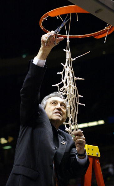 EAST RUTHERFORD, NJ - MARCH 27:  Head coach Eddie Sutton of the Oklahoma State Cowboys celebrates by cutting down the net after defeating the St. Joseph's Hawks 64-62 during their fourth round regional game of the NCAA Division I Men's Basketball Tourname