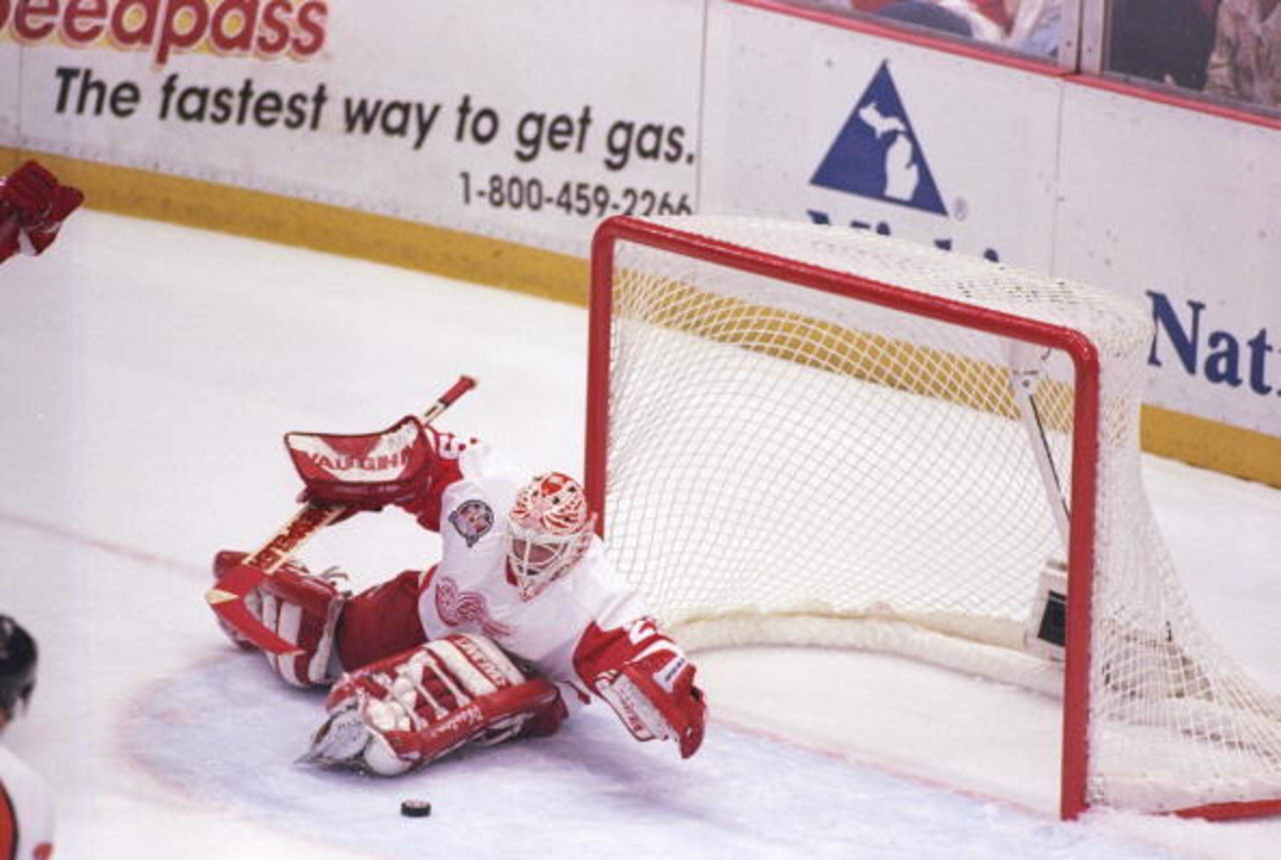 7 Jun 1997:  Goaltender Mike Vernon of the Detroit Red Wings blocks a shot during a playoff game against the Philadelphia Flyers at Joe Louis Arena in Detroit, Michigan.  The Red Wings won the game, 2-1. Mandatory Credit: Al Bello  /Allsport