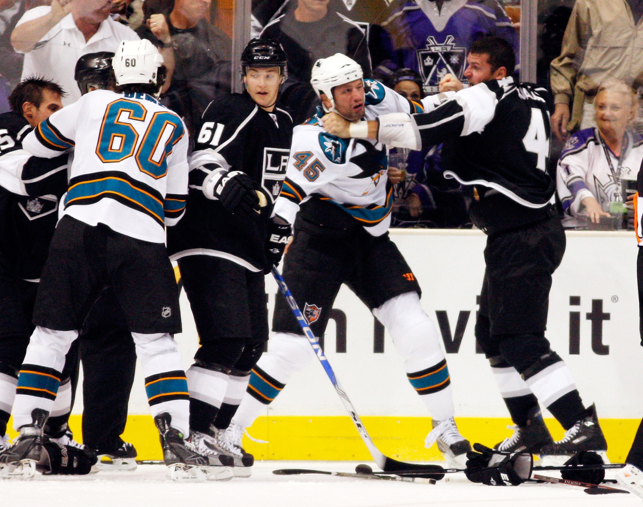 LOS ANGELES, CA - OCTOBER 06:  Jed Ortmeyer #45 of the San Jose Sharks and Raitis Ivanans #41 of the Los Angeles Kings fight during the second period of the NHL hockey game on October 6, 2009 in Los Angeles, California.  (Photo by Kevork Djansezian/Getty
