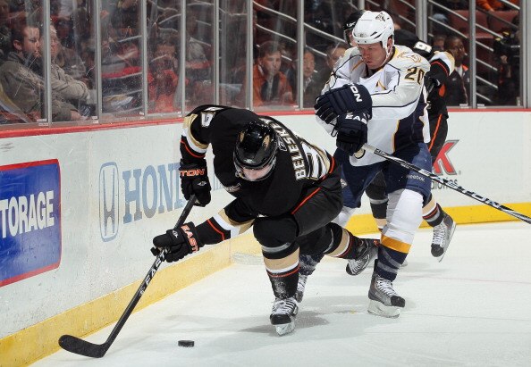 ANAHEIM, CA - JANUARY 05:  Matt Beleskey #39 of the Anaheim Ducks is checked off the puck by Ryan Suter #20 of the Nashville Predators in the first period at the Honda Center on January 5, 2011 in Anaheim, California. The Predators defeated the Ducks 4-1.
