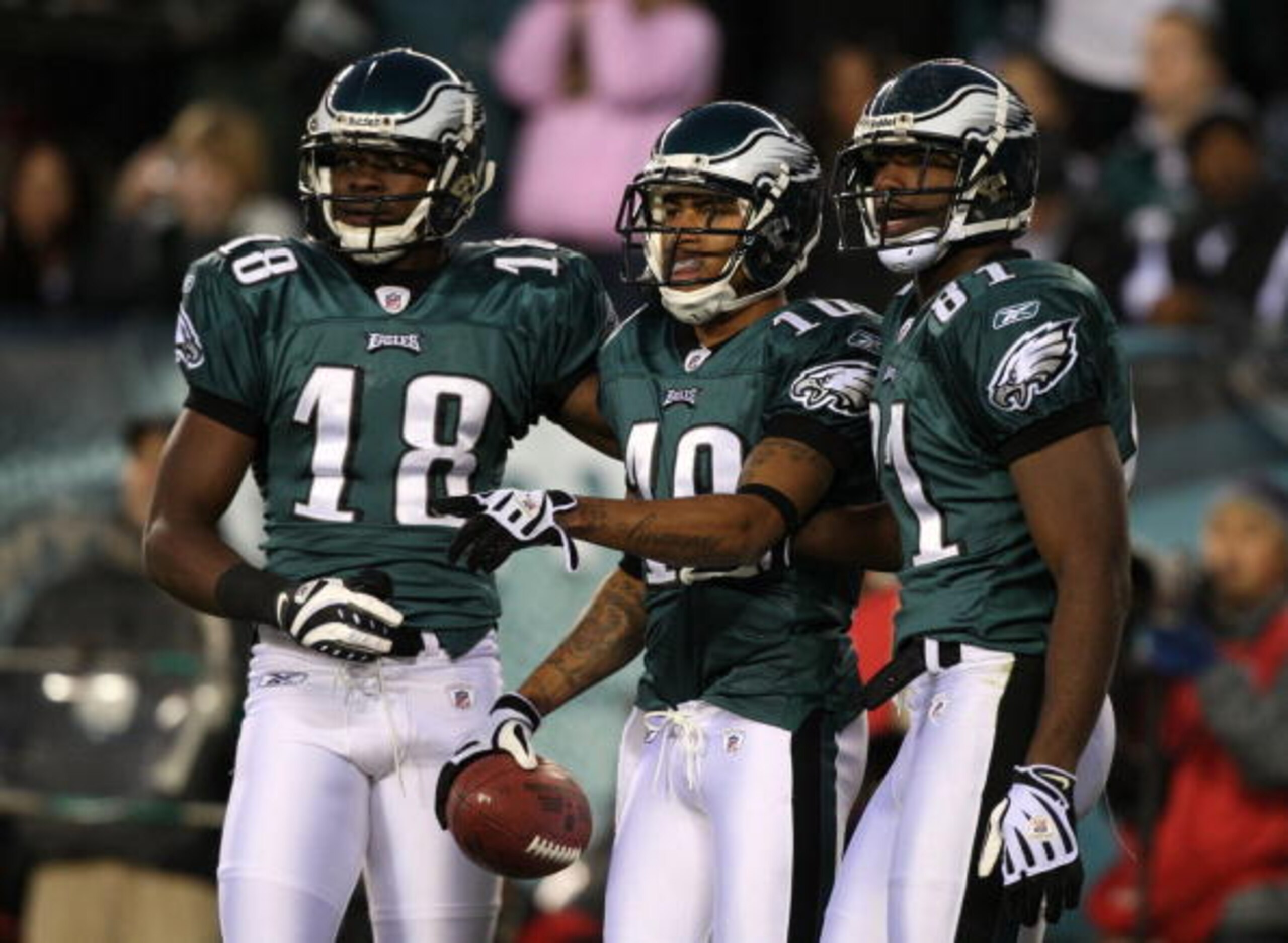 PHILADELPHIA - DECEMBER 27 :  DeSean Jackson #10 of the Philadelphia Eagles celebrates with teammates Jeremy Maclin #18 and Jason Avant #81 after scoring a touchdown in the first quarter againt the Denver Broncos at Lincoln Financial Field on December 27,