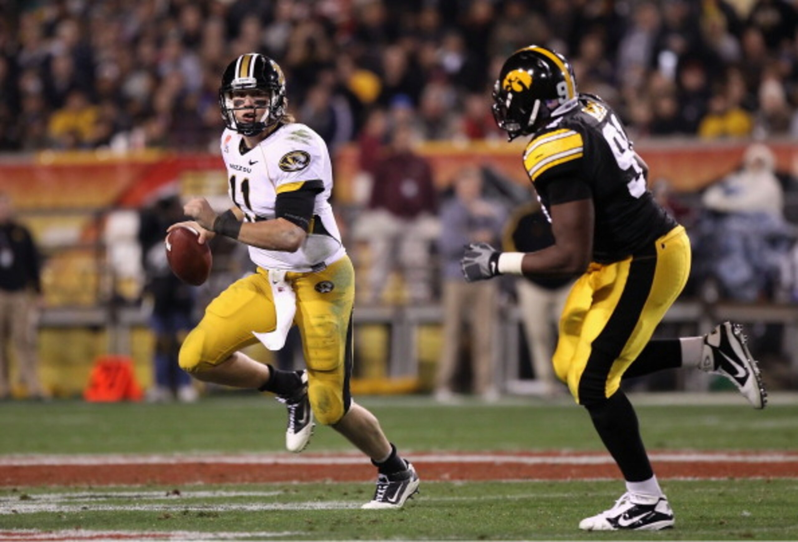 TEMPE, AZ - DECEMBER 28: Quarterback Blaine Gabbert #11 of the Missouri Tigers drops back to pass during the Insight Bowl against the Iowa Hawkeyes at Sun Devil Stadium on December 28, 2010 in Tempe, Arizona. The Hawkeyes defeated the Tigers 27-24. (P TEMPE, AZ - DECEMBER 28: Quarterback Blaine Gabbert #11 of the Missouri Tigers drops back to pass during the Insight Bowl against the Iowa Hawkeyes at Sun Devil Stadium on December 28, 2010 in Tempe, Arizona. The Hawkeyes defeated the Tigers 27-24. (P