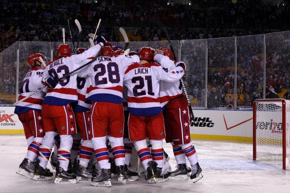 PITTSBURGH, PA - JANUARY 01:  The Washington capitals celebrate together during the 2011 NHL Bridgestone Winter Classic against the Pittsburgh Penguins at Heinz Field on January 1, 2011 in Pittsburgh, Pennsylvania. Washington won 3-1.  (Photo by Jamie Squ