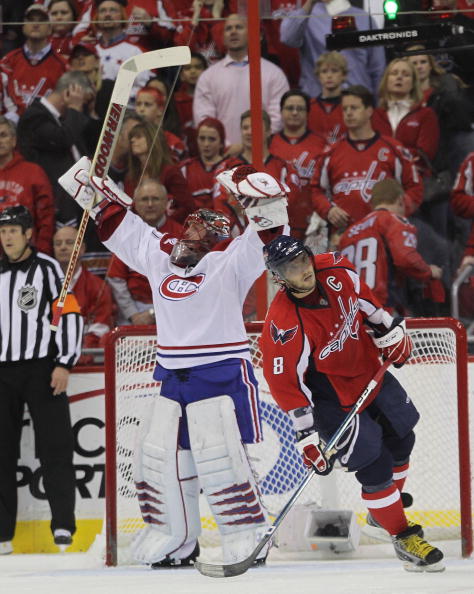 WASHINGTON - APRIL 28: Jaroslav Halak #41 of the Montreal Canadiens celebrates as Alex Ovechkin #8 of the Washington Capitals skates away following the Canadiens 2-1 win in Game Seven of the Eastern Conference Quarterfinals during the 2010 NHL Stanley Cup