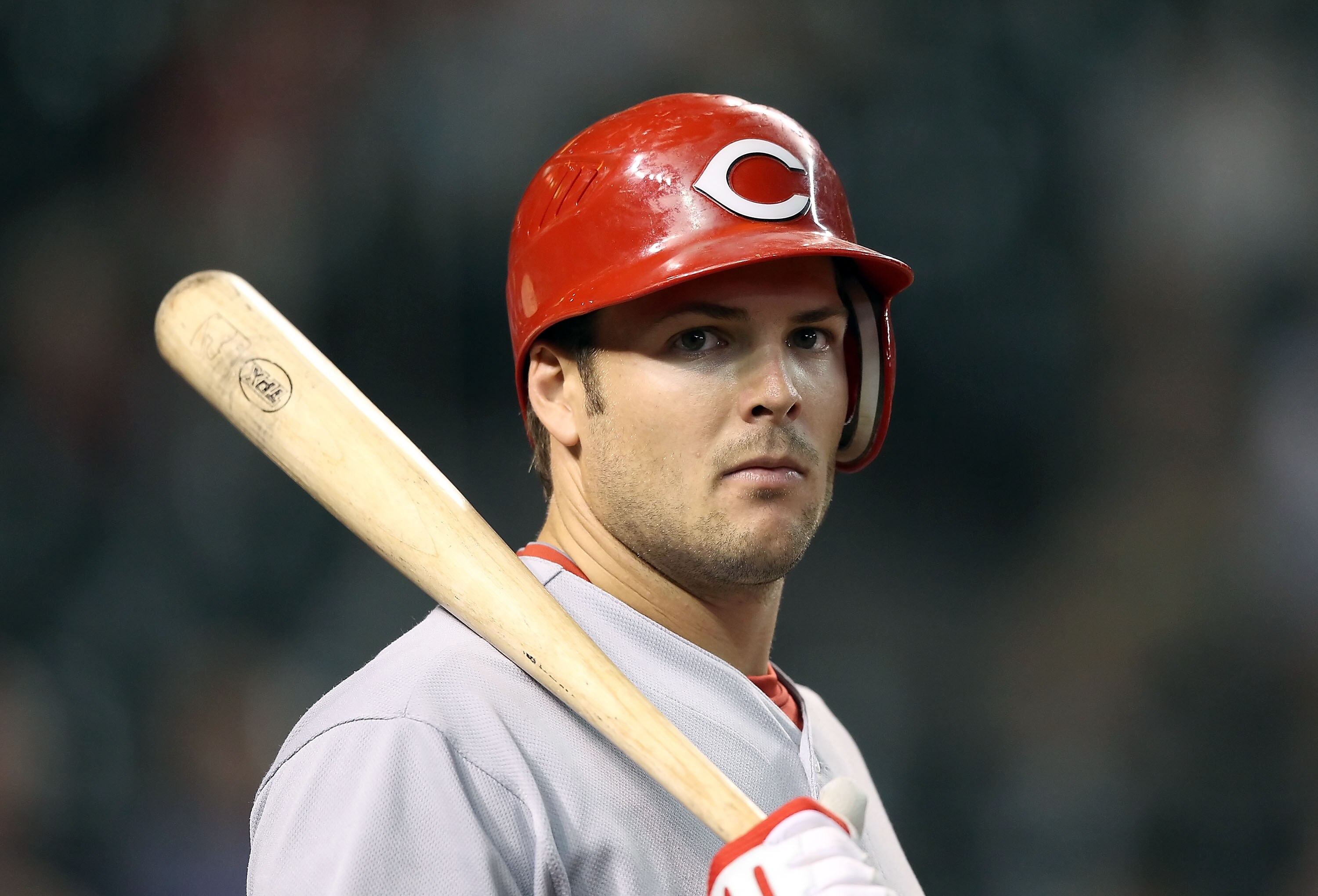 PHOENIX - AUGUST 18:  Chris Heisey #28 of the Cincinnati Reds on deck during the Major League Baseball game against the Arizona Diamondbacks at Chase Field on August 18, 2010 in Phoenix, Arizona.  The Reds defeated the Diamondbacks 11-7.  (Photo by Christ