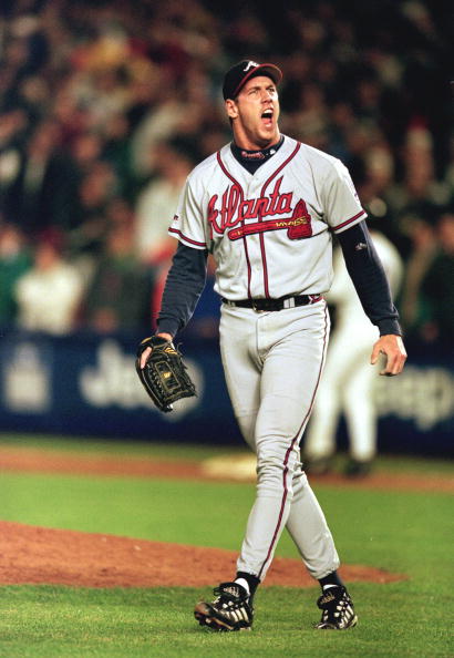15 Oct 1999: Relief pitcher John Rocker #49 of the Atlanta Braves celebrates as he walks off the field during Game 3 of the National League Championship Series against the New York Mets at Shea Stadium in New York. The Braves defeated the Mets 1-0.