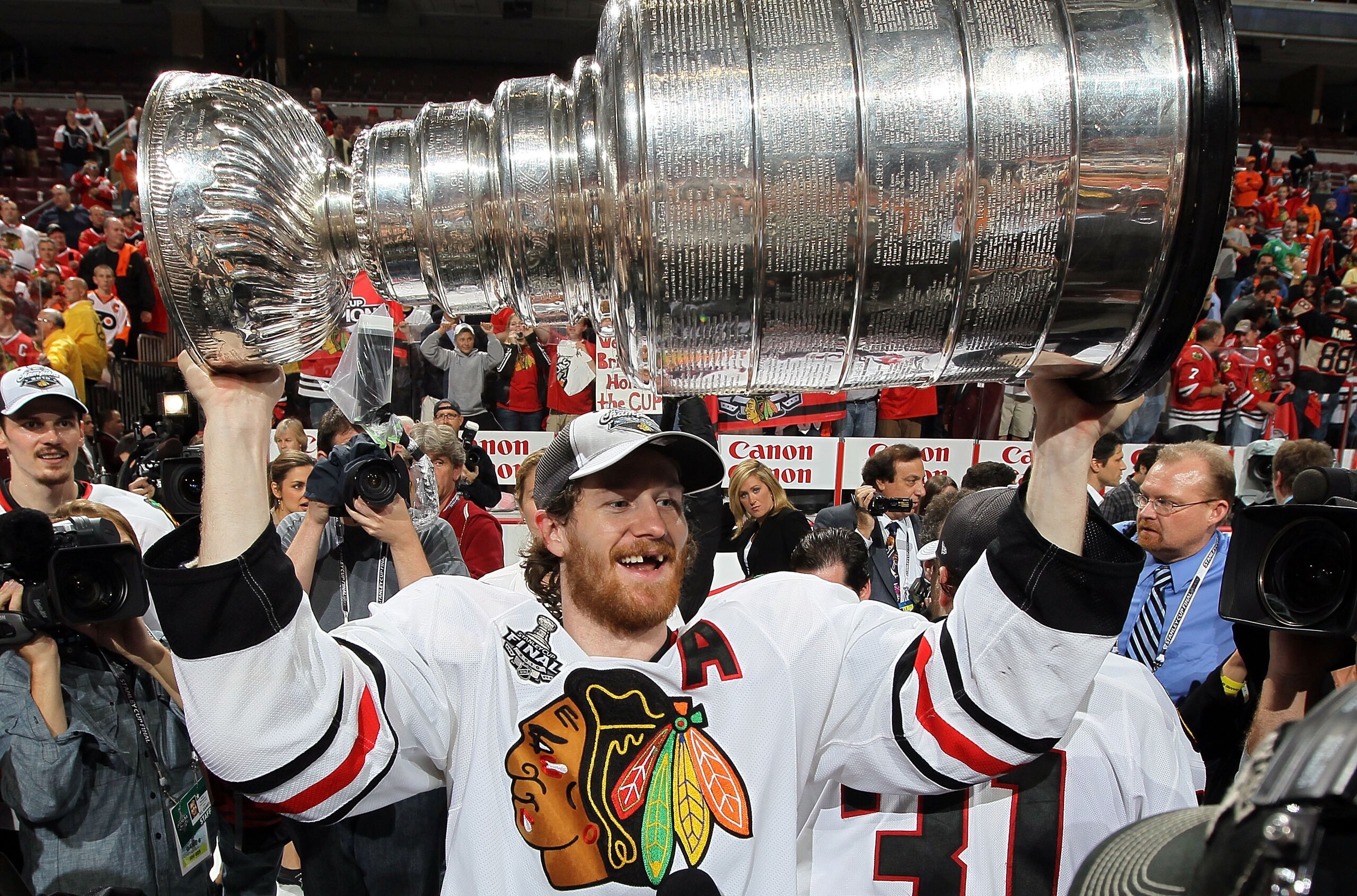 PHILADELPHIA - JUNE 09: Duncan Keith #2 of the Chicago Blackhawks hoists the Stanley Cup after teammate Patrick Kane scored the game-winning goal in overtime to defeat the Philadelphia Flyers 4-3 and win the Stanley Cup in Game Six of the 2010 NHL Stanle PHILADELPHIA - JUNE 09: Duncan Keith #2 of the Chicago Blackhawks hoists the Stanley Cup after teammate Patrick Kane scored the game-winning goal in overtime to defeat the Philadelphia Flyers 4-3 and win the Stanley Cup in Game Six of the 2010 NHL Stanle