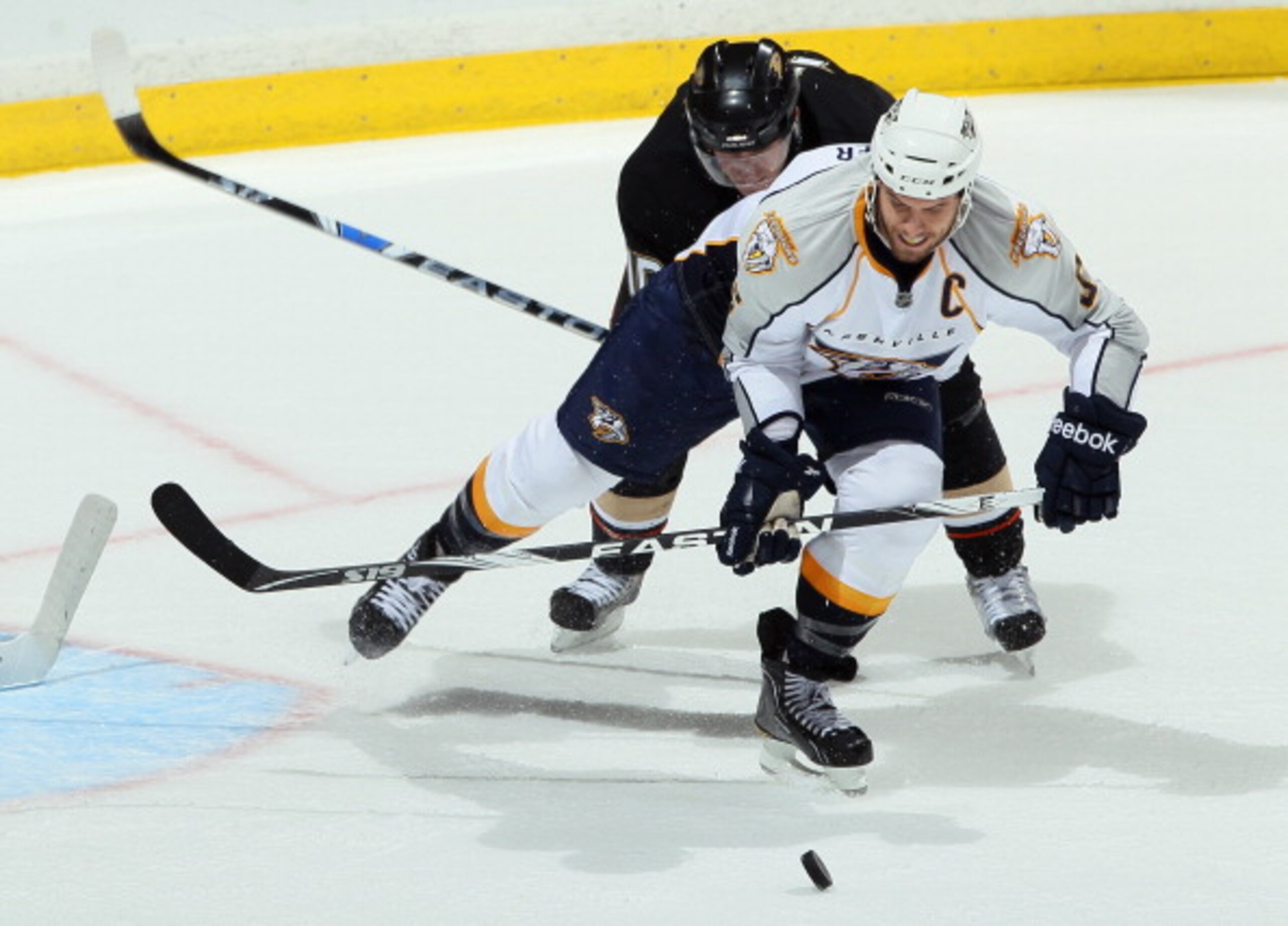 ANAHEIM, CA - JANUARY 05:  Shea Weber #6 of the Nashville Predators is pursued by Corey Perry #10 of the Anaheim Ducks in the third period at the Honda Center on January 5, 2011 in Anaheim, California. The Predators defeated the Ducks 4-1.  (Photo by Jeff