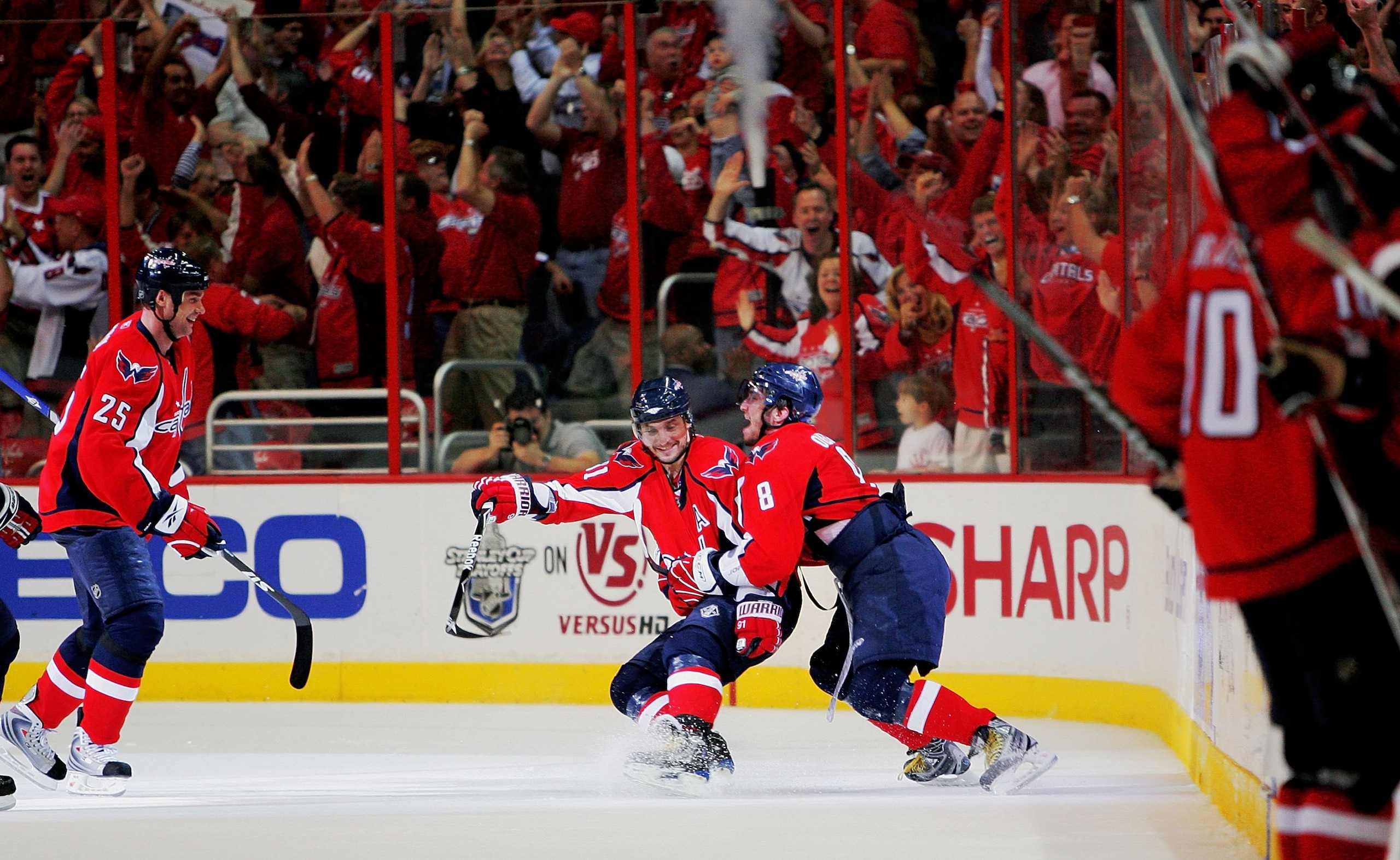 WASHINGTON - APRIL 28:  Alex Ovechkin #8 and Sergei Fedorov #91 of the Washington Capitals celebrate Fedorov's game winning goal against the New York Rangers during Game Seven of the Eastern Conference Quarterfinal Round of the 2009 Stanley Cup Playoffs o