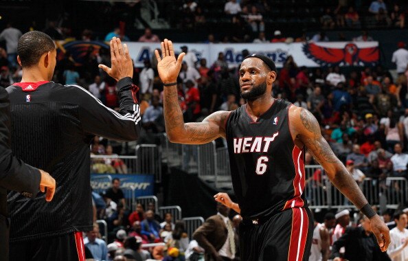 ATLANTA, GA - APRIL 11:  LeBron James #6 of the Miami Heat celebrates after a basket against the Atlanta Hawks at Philips Arena on April 11, 2011 in Atlanta, Georgia.  NOTE TO USER: User expressly acknowledges and agrees that, by downloading and/or using