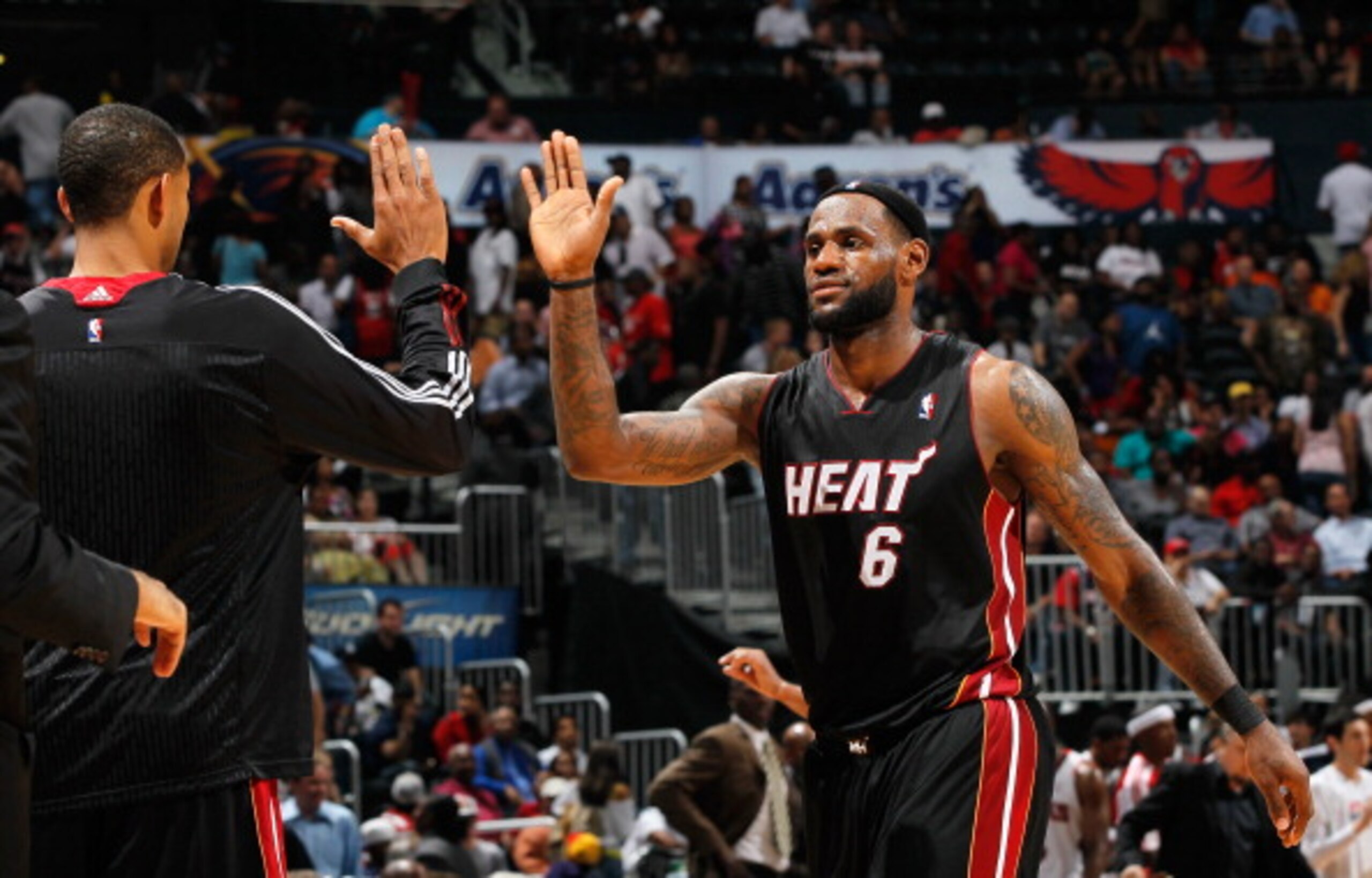 ATLANTA, GA - APRIL 11:  LeBron James #6 of the Miami Heat celebrates after a basket against the Atlanta Hawks at Philips Arena on April 11, 2011 in Atlanta, Georgia.  NOTE TO USER: User expressly acknowledges and agrees that, by downloading and/or using