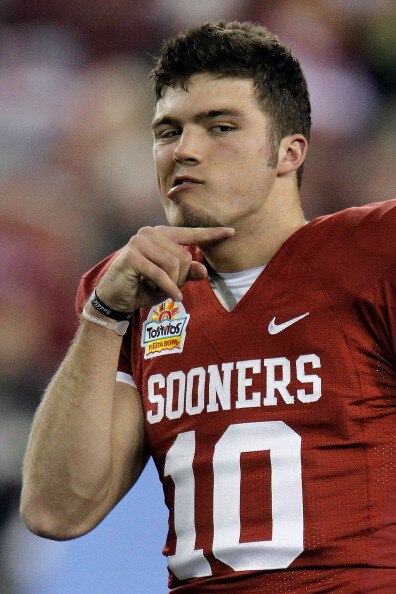 GLENDALE, AZ - JANUARY 01:  Quarterback Blake Bell #10 the Oklahoma Sooners makes a gesture before the Sooners take on the Connecticut Huskies in the Tostitos Fiesta Bowl at the Universtity of Phoenix Stadium on January 1, 2011 in Glendale, Arizona.  (Pho