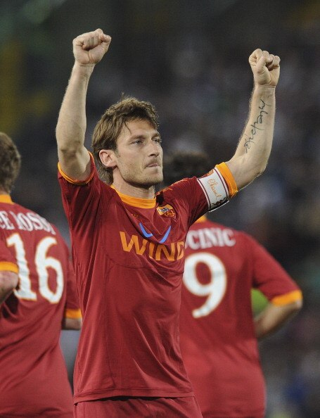 UDINE, ITALY - APRIL 09:  Francesco Totti of Roma celebrates after scoring  his opening penalty goal  during the Serie A match between Udinese Calcio and AS Roma at Stadio Friuli on April 9, 2011 in Udine, Italy.  (Photo by Dino Panato/Getty Images)