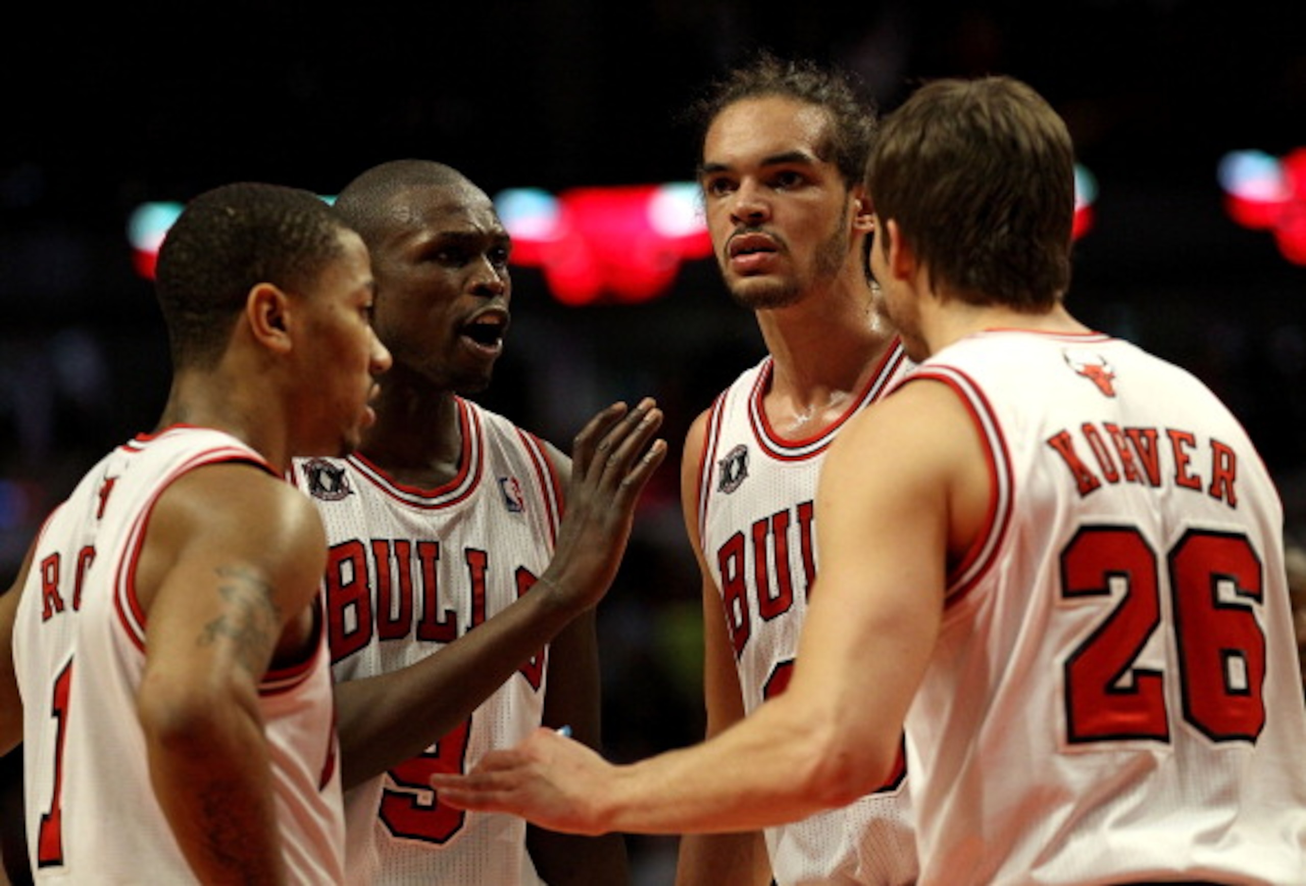 CHICAGO, IL - MARCH 25: (L-R) Derrick Rose #1, Loul Deng #9, Joakim Noah #13 and Kyle Korver #26 of the Chicago Bulls gather to talk during a game against the Memphis Grizzlies at the United Center on March 25, 2011 in Chicago, Illinois. The Bulls defeate CHICAGO, IL - MARCH 25: (L-R) Derrick Rose #1, Loul Deng #9, Joakim Noah #13 and Kyle Korver #26 of the Chicago Bulls gather to talk during a game against the Memphis Grizzlies at the United Center on March 25, 2011 in Chicago, Illinois. The Bulls defeate
