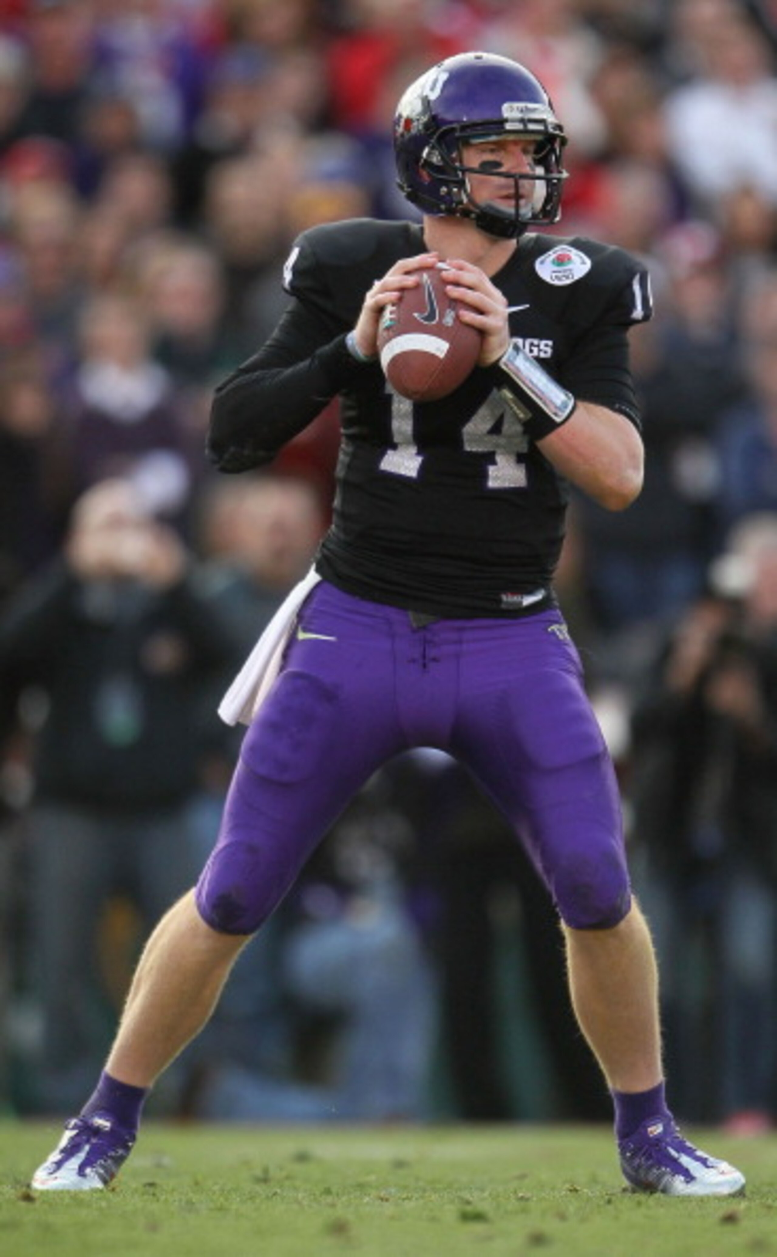 PASADENA, CA - JANUARY 01: Quarterback Andy Dalton #14 of the TCU Horned Frogs looks to pass against the Wisconsin Badgers in the 97th Rose Bowl game on January 1, 2011 in Pasadena, California. (Photo by Jeff Gross/Getty Images) PASADENA, CA - JANUARY 01: Quarterback Andy Dalton #14 of the TCU Horned Frogs looks to pass against the Wisconsin Badgers in the 97th Rose Bowl game on January 1, 2011 in Pasadena, California. (Photo by Jeff Gross/Getty Images)
