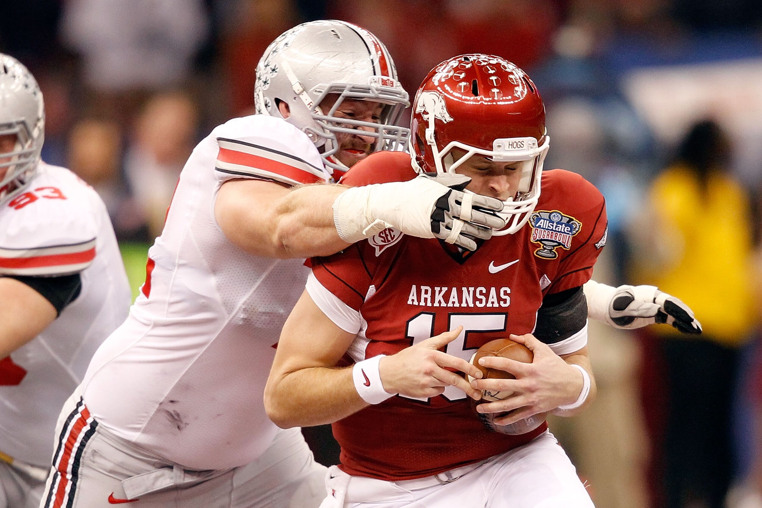 NEW ORLEANS, LA - JANUARY 04:  Dexter Larimore #72 of the Ohio State Buckeyes sacks Ryan Mallett #15 of the Arkansas Razorbacks in the second quarter during the Allstate Sugar Bowl at the Louisiana Superdome on January 4, 2011 in New Orleans, Louisiana.