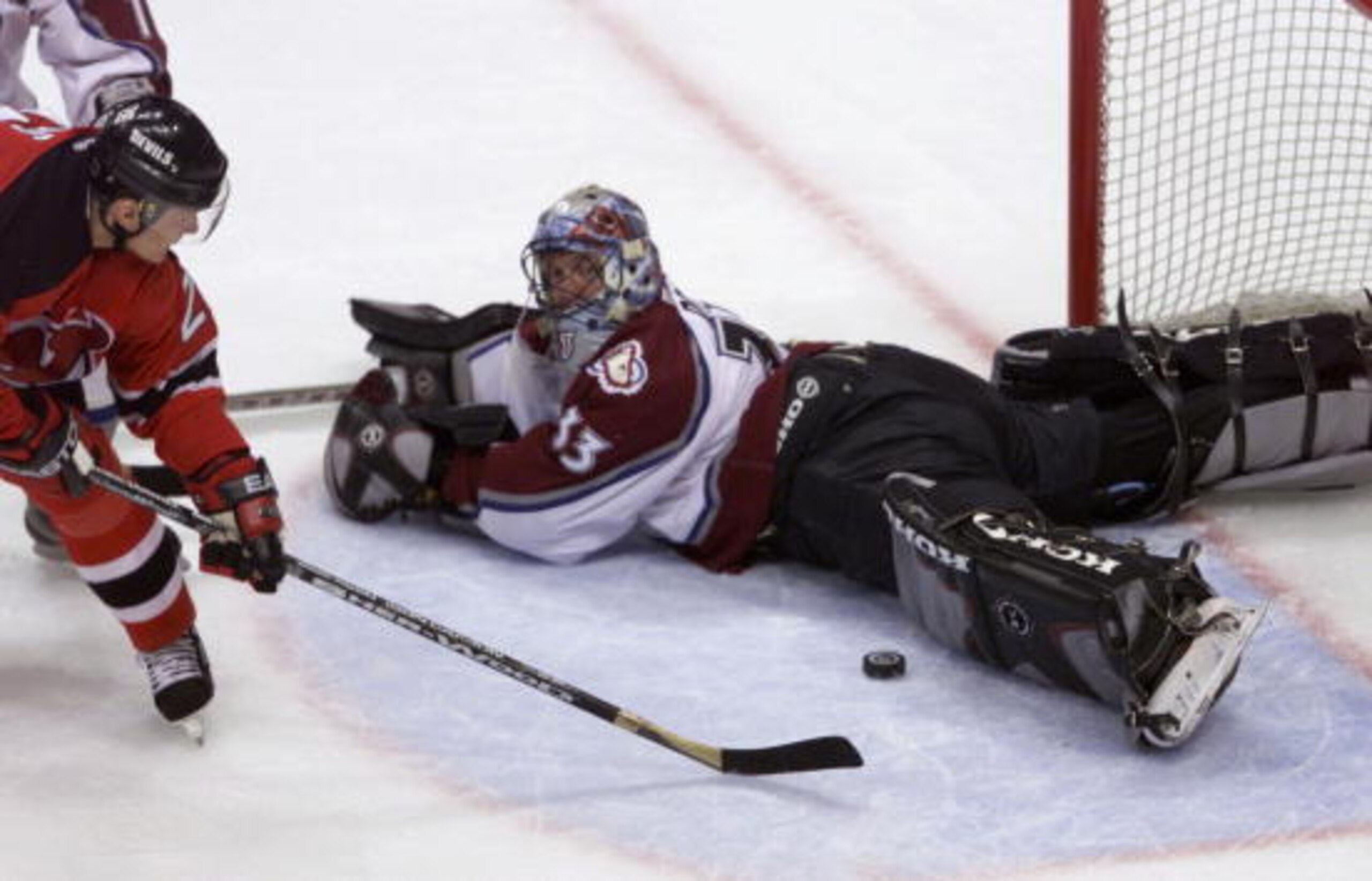 9 Jun 2001:  Goalie Patrick Roy #33 of the Colorado Avalanche makes a save on goal against Patrik Elias #26 of the New Jersey Devils during game seven of the Stanley Cup finals at the Pepsi Center in Denver, Colorado.  DIGITAL IMAGE Mandatory Credit: Bria