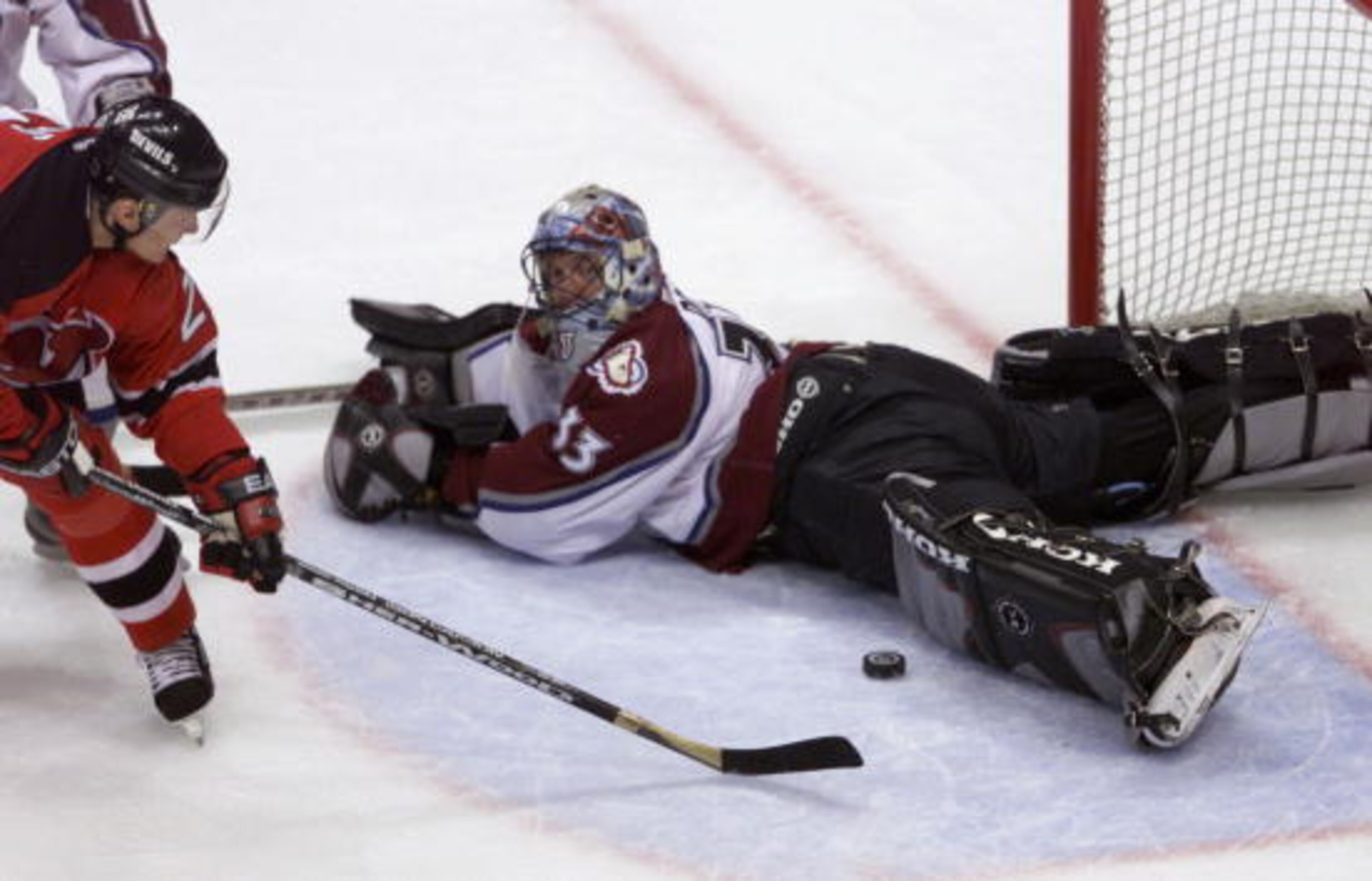 9 Jun 2001:  Goalie Patrick Roy #33 of the Colorado Avalanche makes a save on goal against Patrik Elias #26 of the New Jersey Devils during game seven of the Stanley Cup finals at the Pepsi Center in Denver, Colorado.  DIGITAL IMAGE Mandatory Credit: Bria
