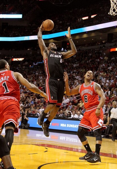 MIAMI, FL - MARCH 06:  LeBron James #6 of the Miami Heat shoots over Keith Bogans #6 of the Chicago Bulls during a game at American Airlines Arena on March 6, 2011 in Miami, Florida. NOTE TO USER: User expressly acknowledges and agrees that, by downloadin