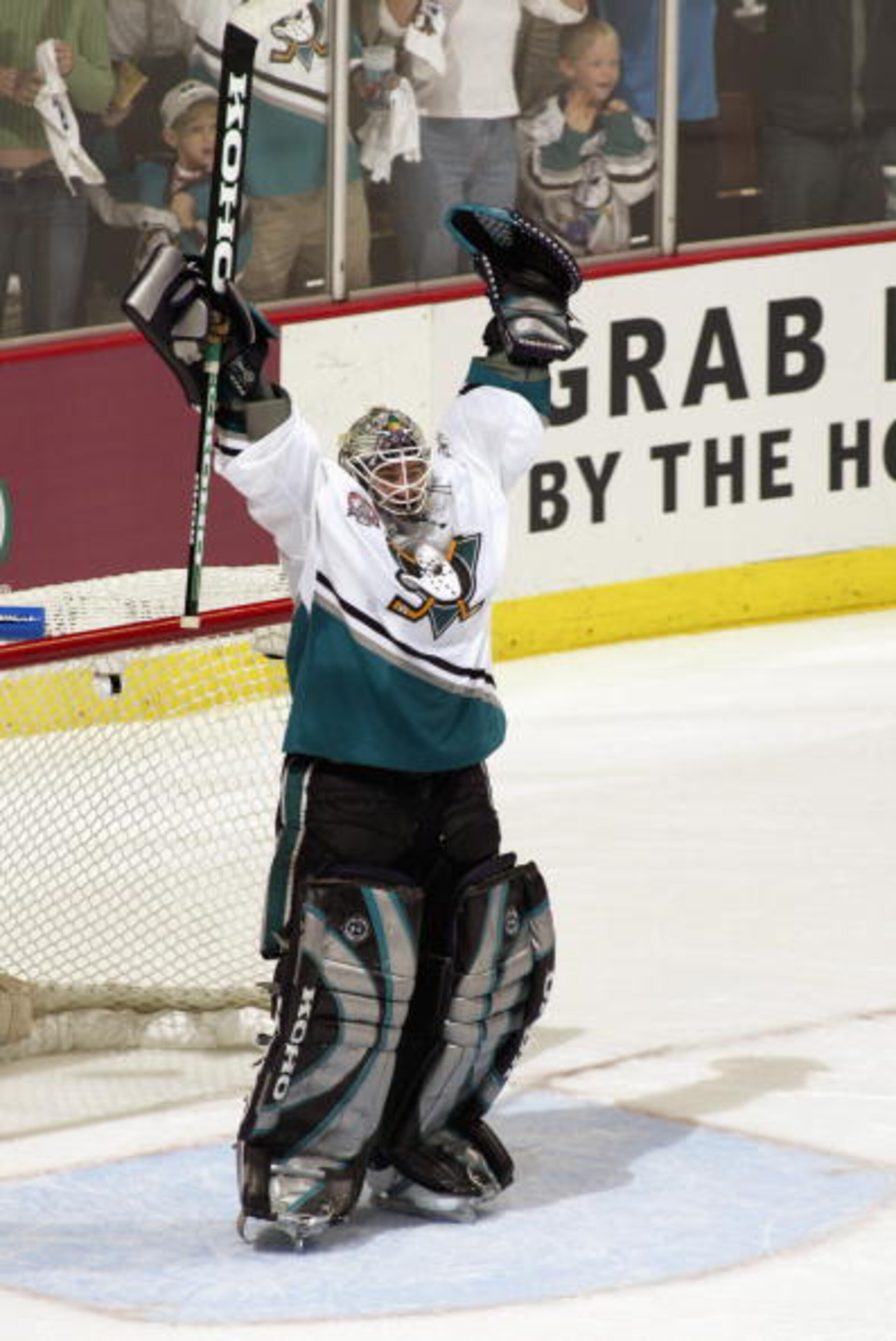 ANAHEIM, CA - JUNE 7:  Jean-Sebastien Giguere #35 of the Mighty Ducks of Anaheim celebrates after a victory over the New Jersey Devils in game six of the 2003 Stanley Cup Finals at the Arrowhead Pond of Anaheim on June 7, 2003 in Anaheim, California. The