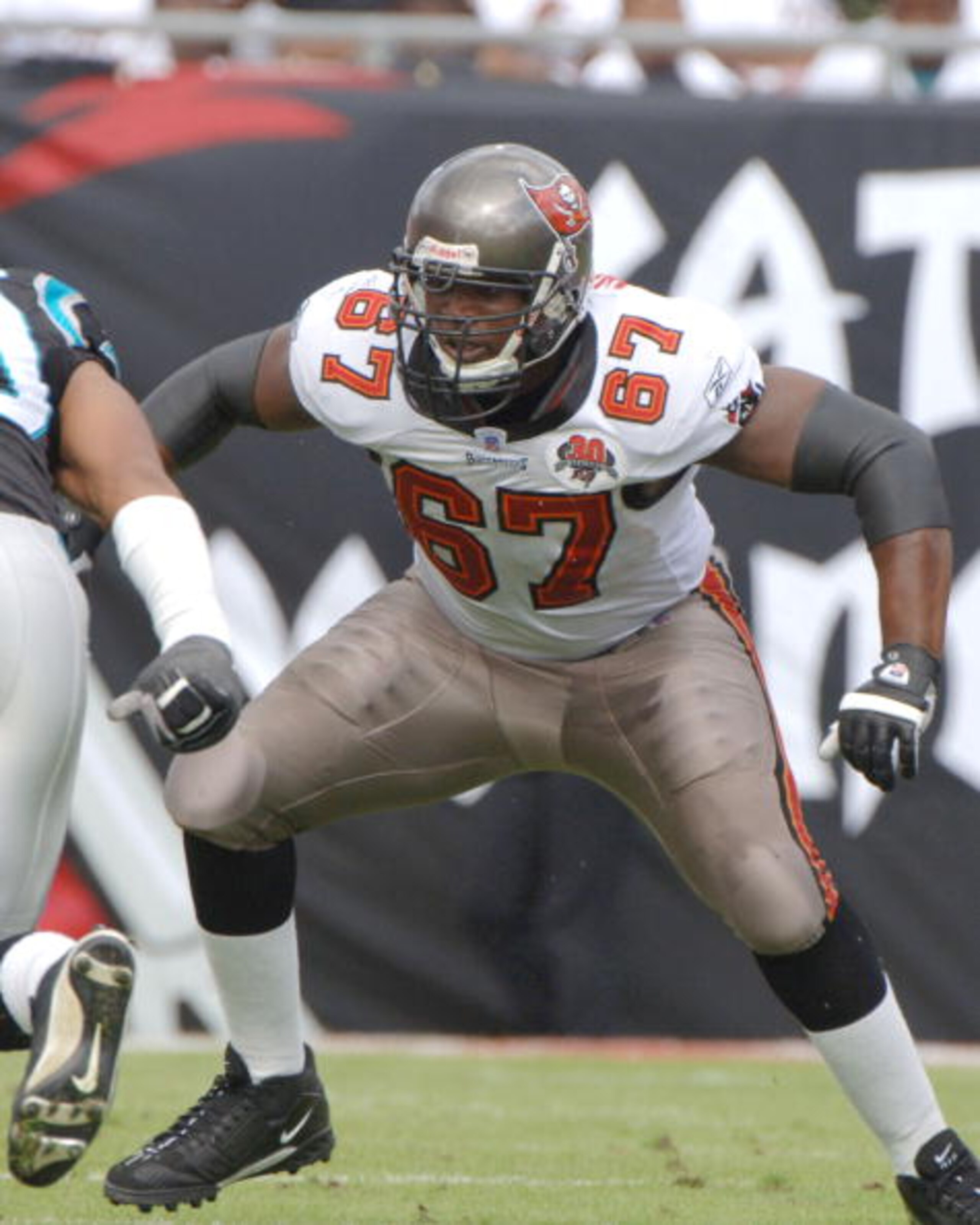 Tampa Bay Buccaneers tackle Kenyatta Walker sets to block against the Carolina Panthers November 6, 2005 in Tampa.  The Panthers defeated the Bucs 34 - 14.  (Photo by Al Messerschmidt/Getty Images)