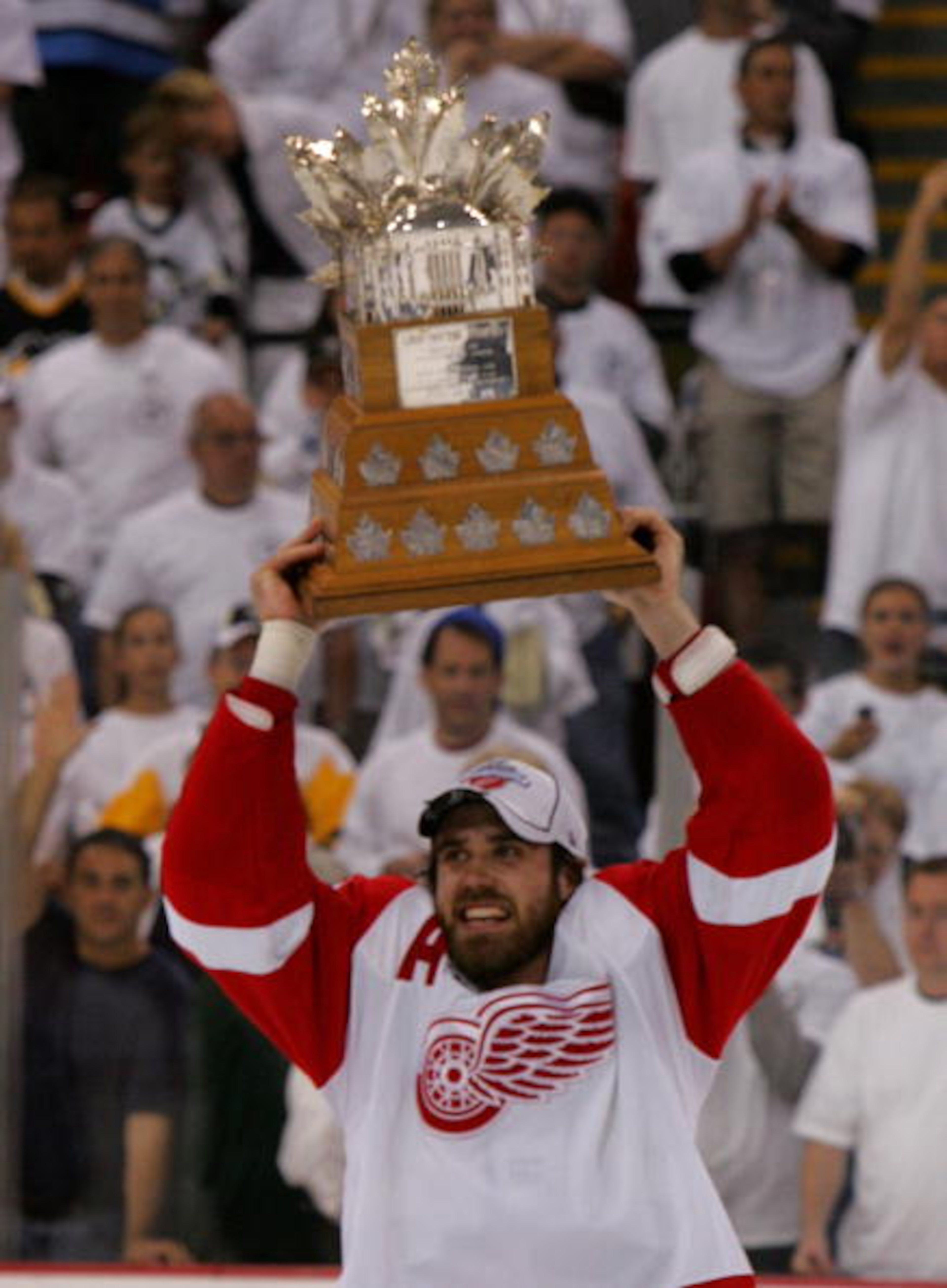 PITTSBURGH - JUNE 04: Stanley Cup Playoff MVP, Henrik Zetterberg #40 of the Detroit Red Wings skates with the Conn Smythe trophy after defeating the Pittsburgh Penguins in game six of the 2008 NHL Stanley Cup Finals at Mellon Arena on June 4, 2008 in Pitt