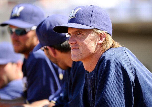 PHOENIX, AZ - MARCH 10:  Pitcher Zack Greinke #13  of the Milwaukee Brewers looks on during the spring training baseball game against Colorado Rockies at Maryvale Baseball Park on March 10, 2011 in Phoenix, Arizona.  (Photo by Kevork Djansezian/Getty Imag