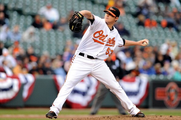 BALTIMORE, MD - APRIL 09:  Zach Britton #53 of the Baltimore Orioles pitches against the Texas Rangers at Oriole Park at Camden Yards on April 9, 2011 in Baltimore, Maryland.  (Photo by Greg Fiume/Getty Images)