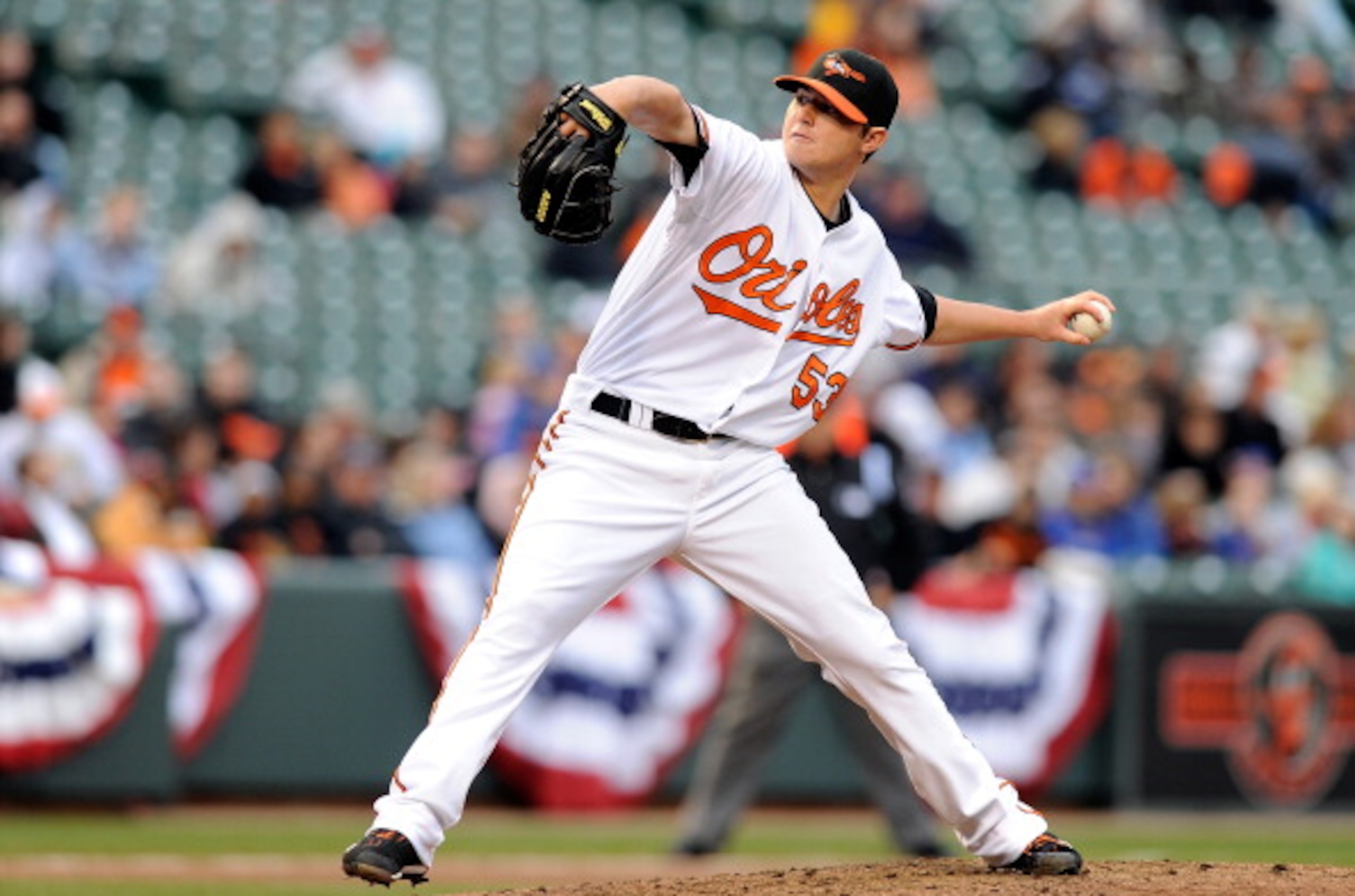 BALTIMORE, MD - APRIL 09:  Zach Britton #53 of the Baltimore Orioles pitches against the Texas Rangers at Oriole Park at Camden Yards on April 9, 2011 in Baltimore, Maryland.  (Photo by Greg Fiume/Getty Images)