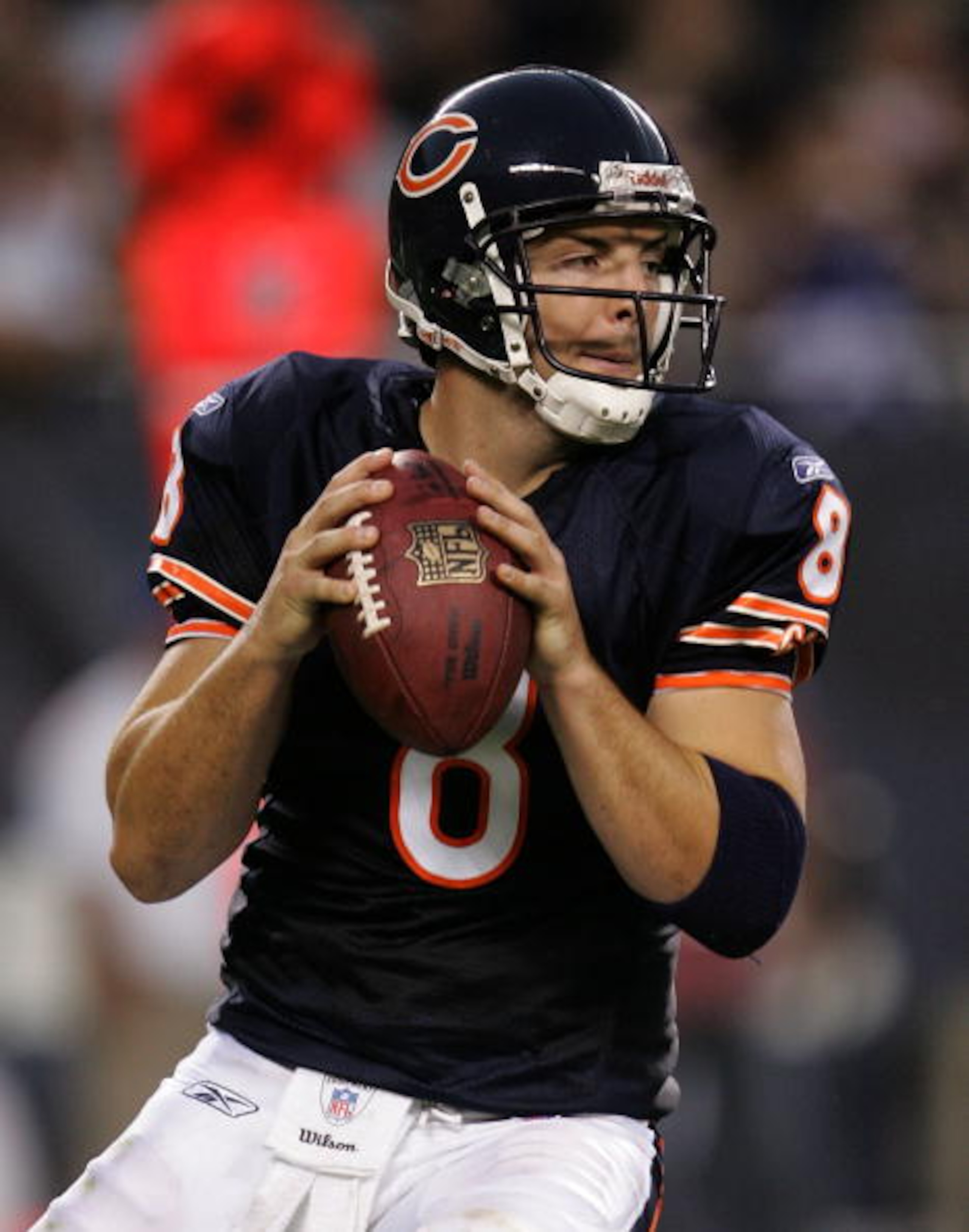CHICAGO - AUGUST 25:  Rex Grossman #8 of the Chicago Bears looks for a receiver during a preseason game against the San Francisco 49ers at Soldier Field August 25, 2007 in Chicago, Illinois. (Photo by Jonathan Daniel/Getty Images)