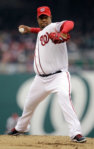 WASHINGTON, DC - MARCH 31: Starting pitcher Livan Hernandez #61 of the Washington Nationals delivers to a Atlanta Braves batter during the third inning at Nationals Park on March 31, 2011 in Washington, DC.  (Photo by Rob Carr/Getty Images)