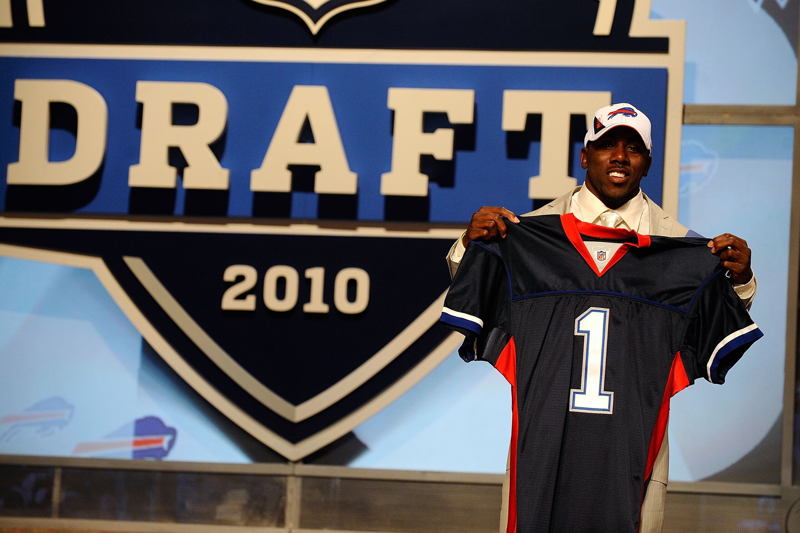 NEW YORK - APRIL 22:  C.J. Spiller from the Clemson Tigers holds up a Buffalo Bills jersey after he was selected #9 overall by the Bills during the first round of the 2010 NFL Draft at Radio City Music Hall on April 22, 2010 in New York City.  (Photo by J