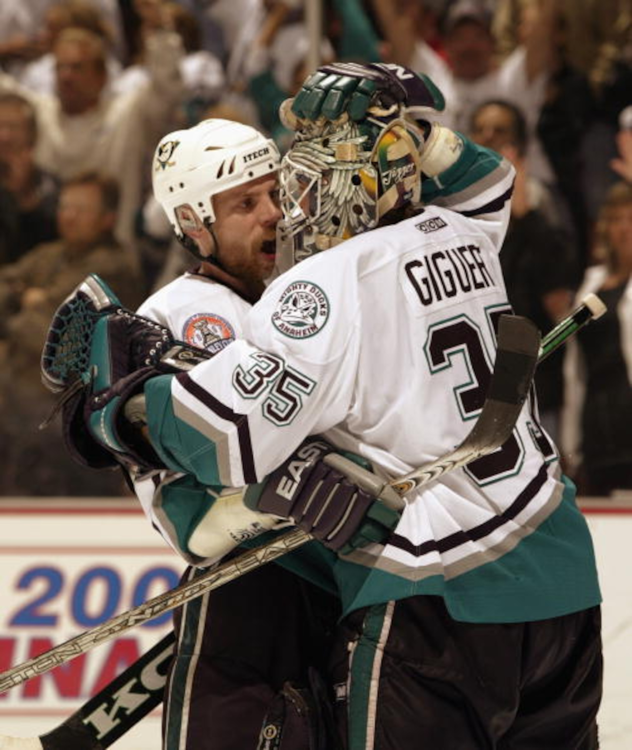 ANAHEIM, CA - JUNE 7:  Jean-Sebastien Giguere #35 and Niclas Havelid #28 of the Anaheim Mighty Ducks celebrate    during Game Six of the 2003 Stanley Cup Finals against the New Jersey Devils at the Arrowhead Pond of Anaheim on June 7, 2003 in Anaheim, Cal