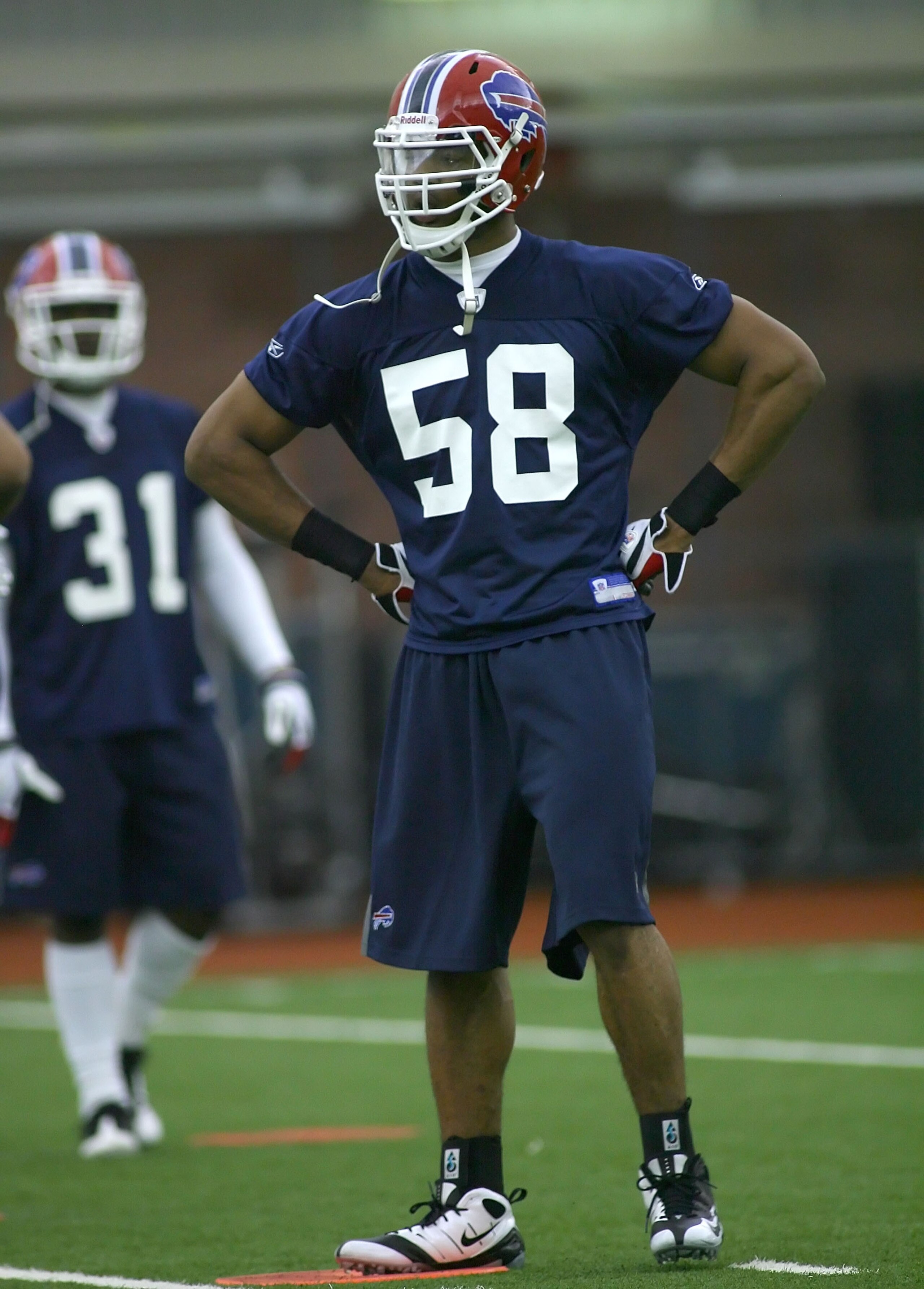 ORCHARD PARK, NY - MAY 01: Aaron Maybin #58, 2009 first round draft pick of the Buffalo Bills waits in between plays during Buffalo Bills minicamp at the Buffalo Bills Fieldhouse on May 1, 2009 in Orchard Park, New York.  (Photo by Rick Stewart/Getty Imag