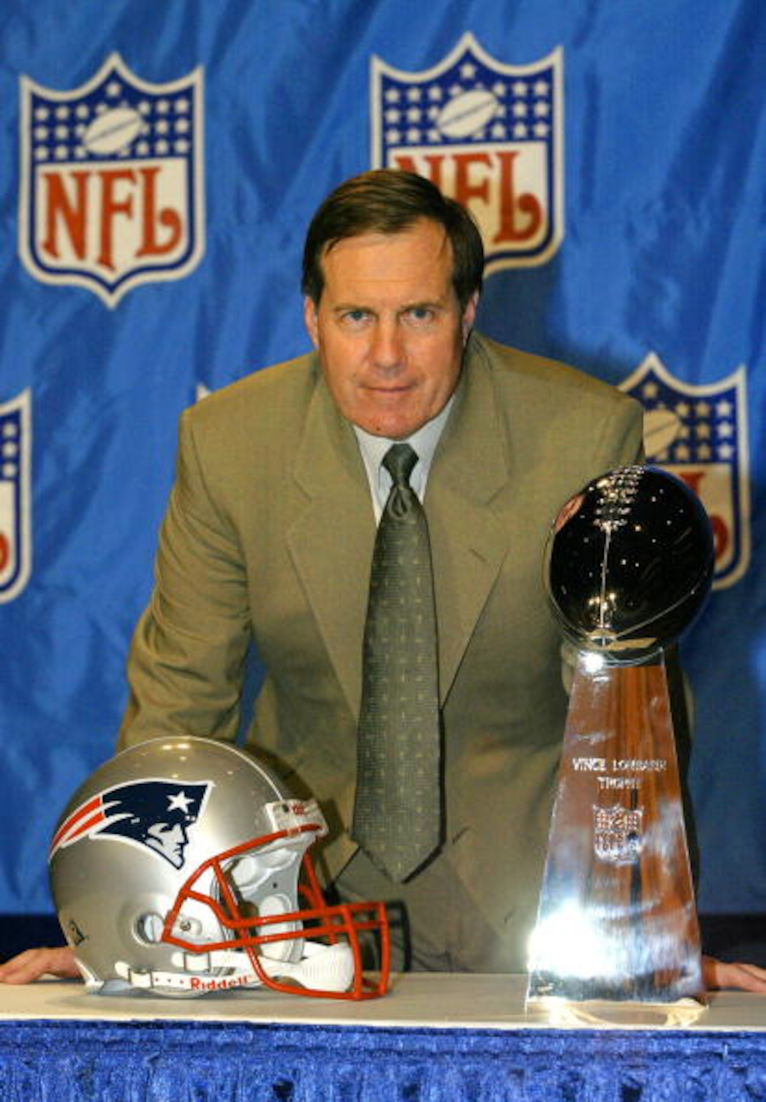 1 Feb 2002:   Head coach Bill Belichick of the New England Patriots poses with the Vince Lombardi Trophy after a press conference at the Ernest N. Morial Convention Center in New Orleans, Louisiana.  Belichick hopes to be holding the trophy after the Supe