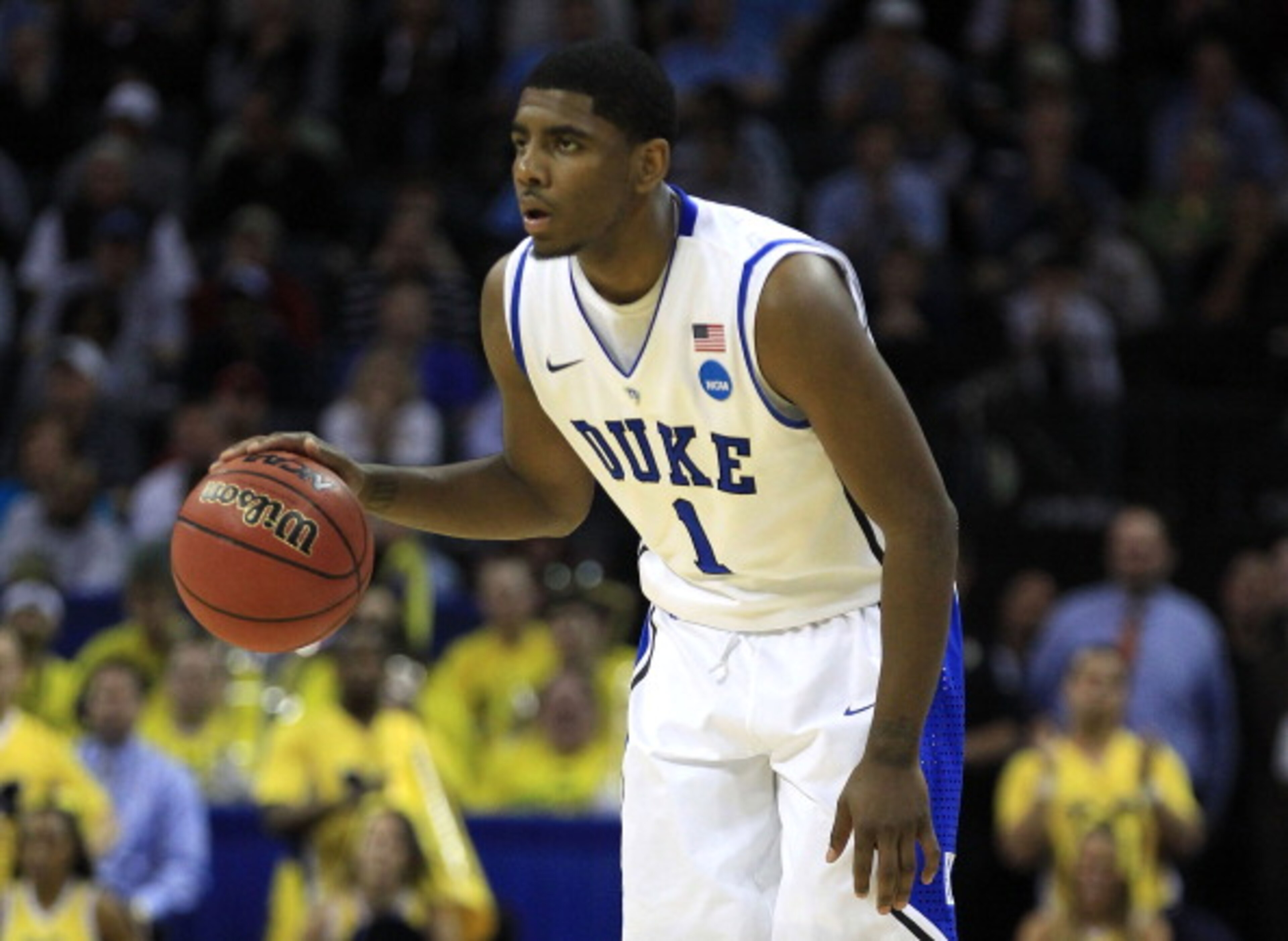 CHARLOTTE, NC - MARCH 20:  Kyrie Irving #1 of the Duke Blue Devils moves the ball while taking on the Michigan Wolverines during the third round of the 2011 NCAA men's basketball tournament at Time Warner Cable Arena on March 20, 2011 in Charlotte, North