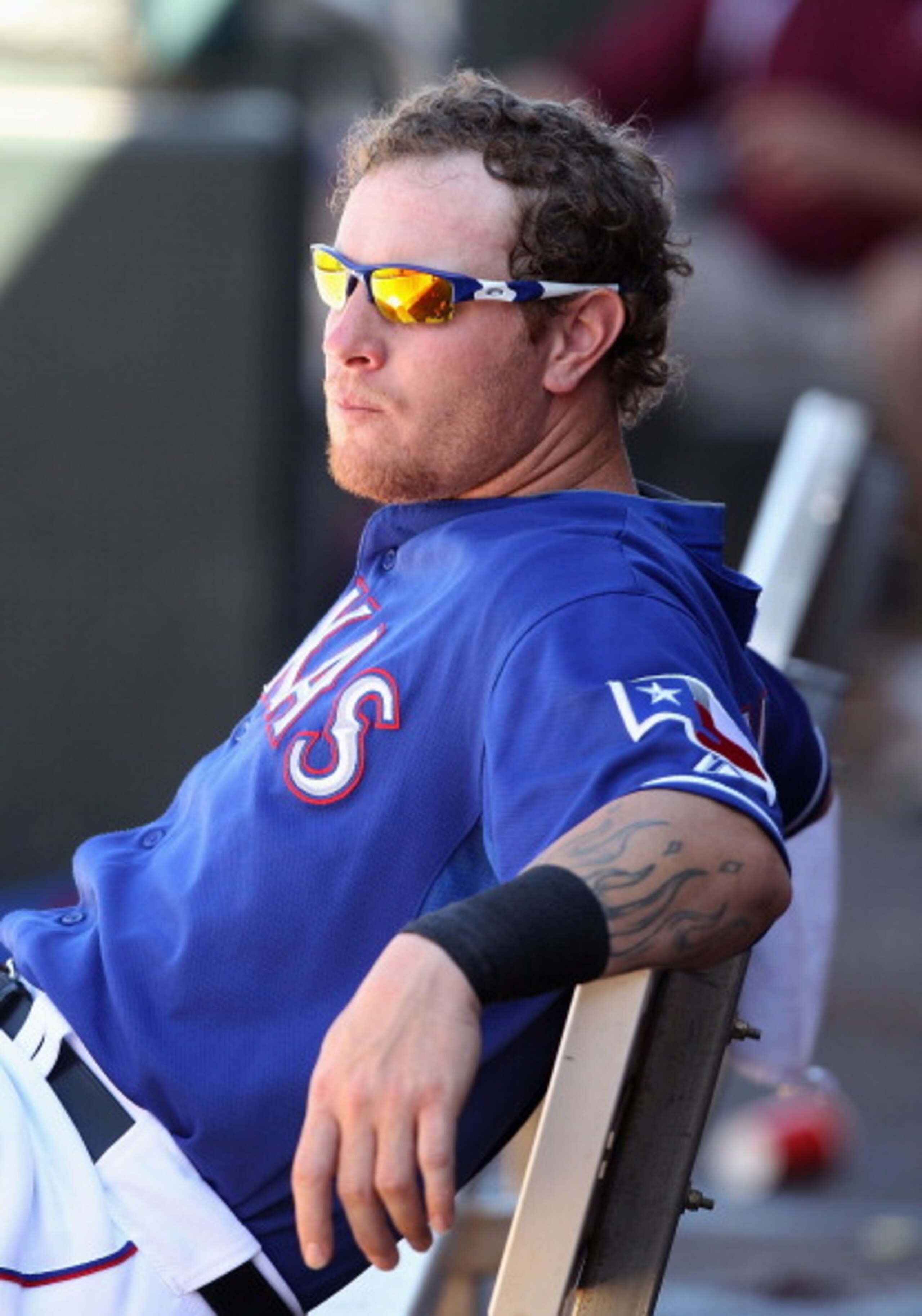 SURPRISE, AZ - MARCH 11: Josh Hamilton #32 of the Texas Rangers sits in the dugout during the spring training game against the Cincinnati Reds at Surprise Stadium on March 11, 2011 in Surprise, Arizona. (Photo by Christian Petersen/Getty Images) SURPRISE, AZ - MARCH 11: Josh Hamilton #32 of the Texas Rangers sits in the dugout during the spring training game against the Cincinnati Reds at Surprise Stadium on March 11, 2011 in Surprise, Arizona. (Photo by Christian Petersen/Getty Images)