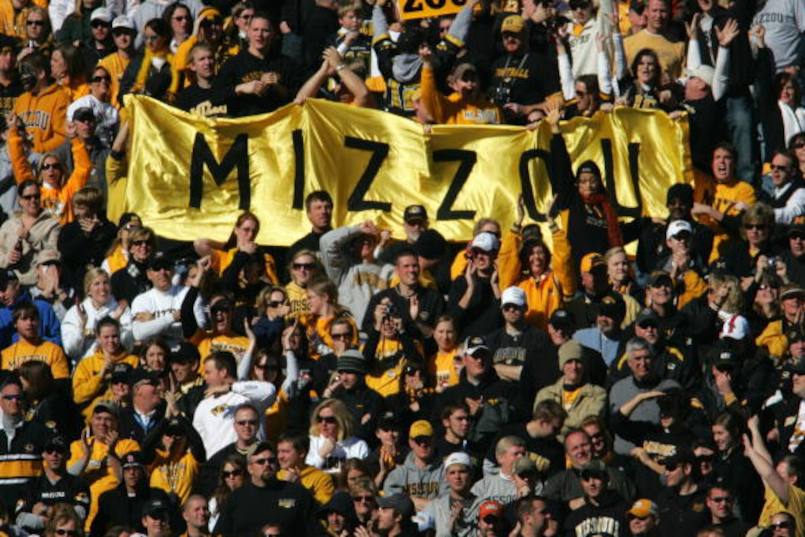 DALLAS - JANUARY 1: Fans of the Missouri Tigers cheer against the Arkansas Razorbacks during the AT&T Cotton Bowl Classic on January 1, 2008 at the Cotton Bowl in Dallas, Texas. (Photo by Ronald Martinez/Getty Images)