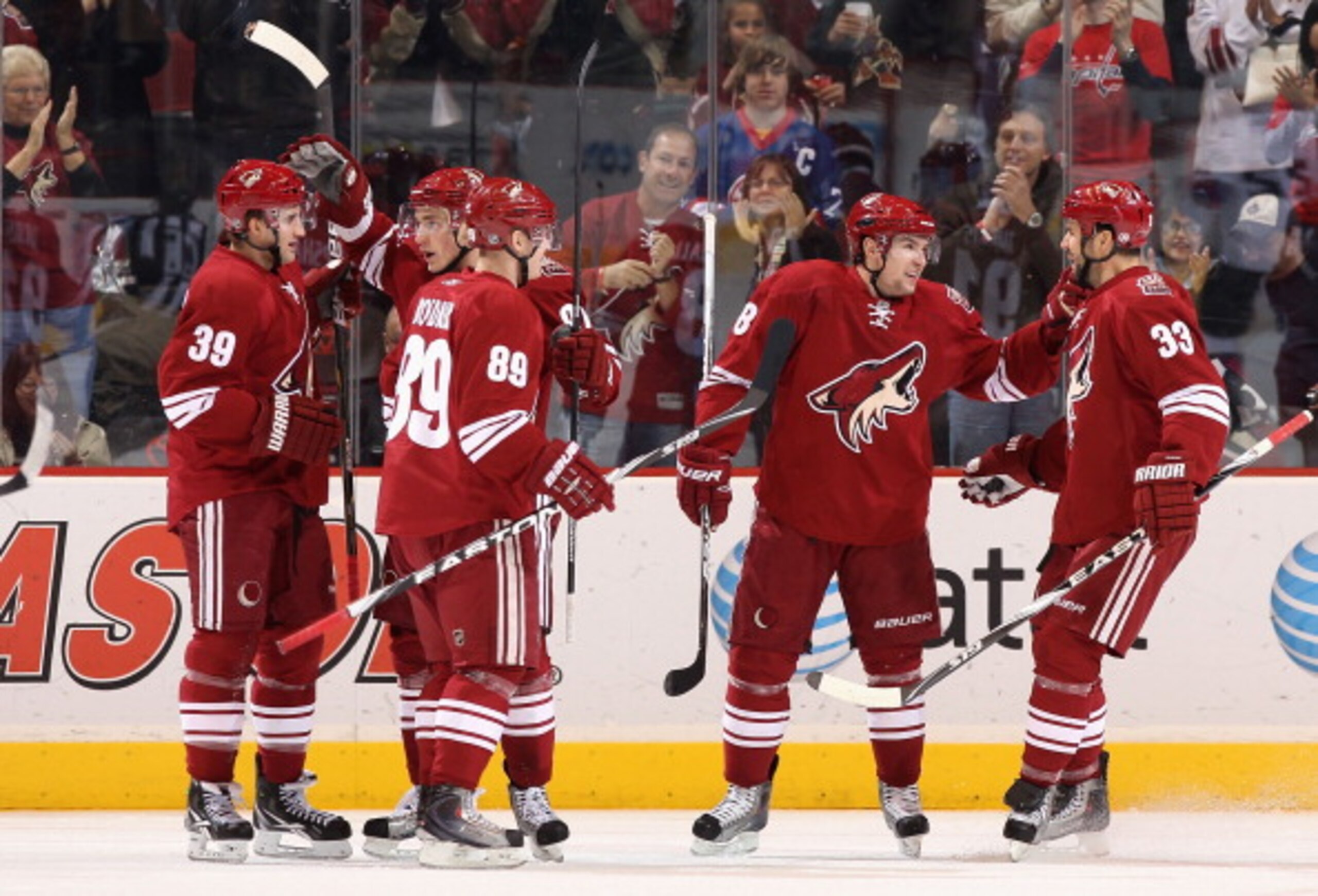GLENDALE, AZ - DECEMBER 29:  Brett MacLean #39 (L) of the Phoenix Coyotes celebrates with teammates after scoring a first period power play goal against the Los Angeles Kings during the NHL game at Jobing.com Arena on December 29, 2010 in Glendale, Arizon
