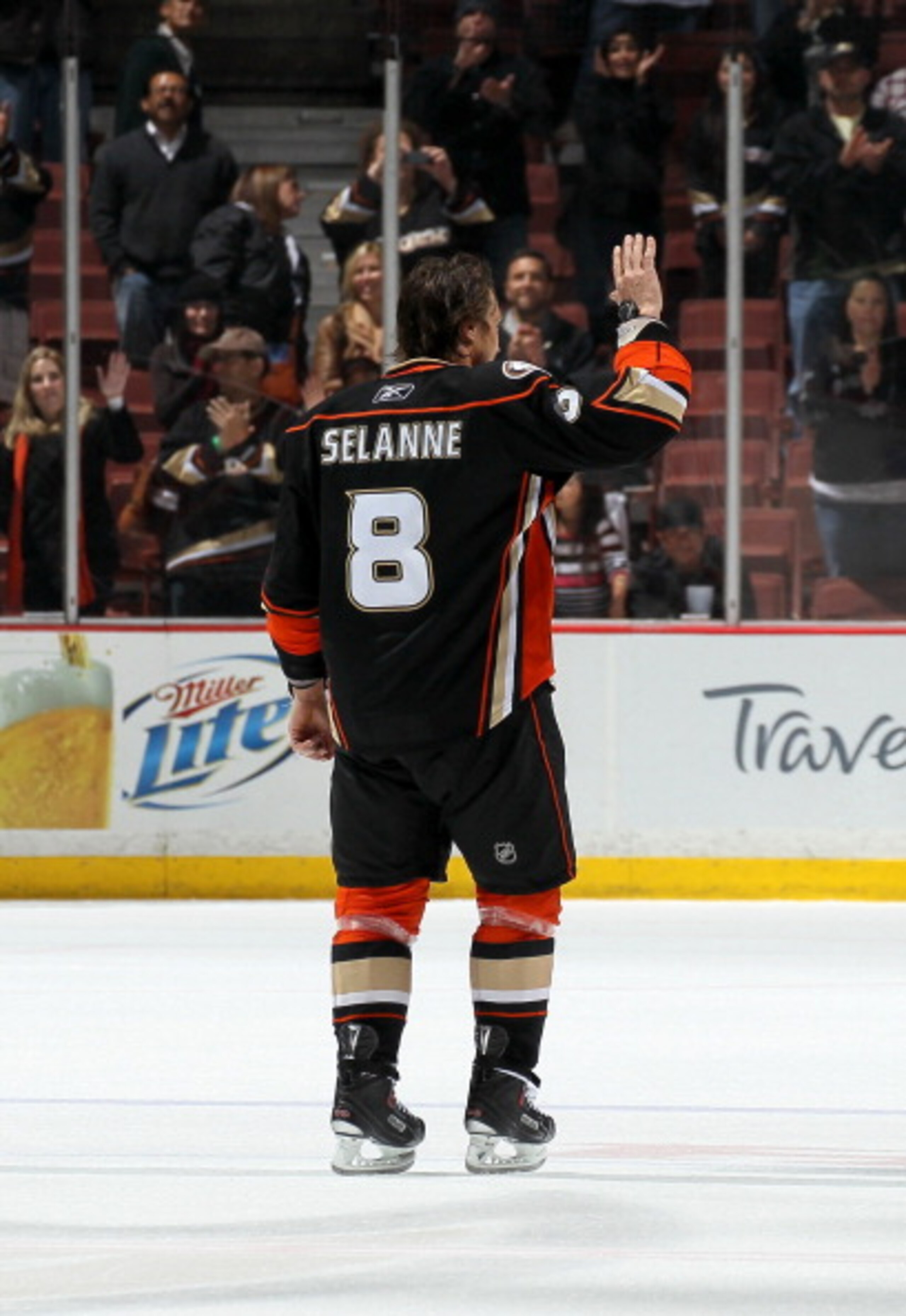 ANAHEIM, CA - APRIL 08:  Teemu Selanne #8 of the Anaheim Ducks waves as he skates after being named first star of the game against the Los Angeles King at Honda Center on April 8, 2011 in Anaheim, California. The Ducks won 2-1 to clinch a berth in the pla