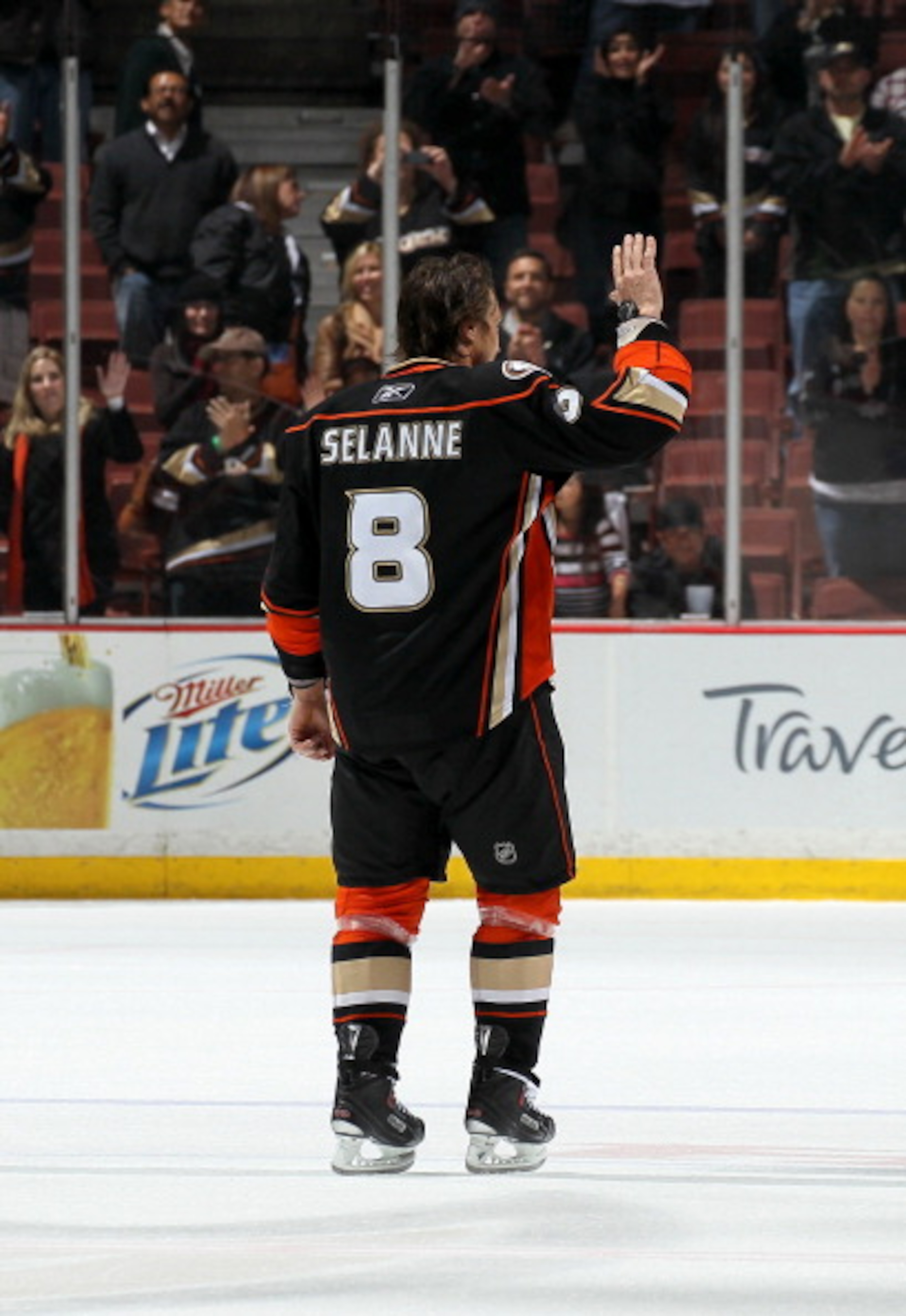 ANAHEIM, CA - APRIL 08:  Teemu Selanne #8 of the Anaheim Ducks waves as he skates after being named first star of the game against the Los Angeles King at Honda Center on April 8, 2011 in Anaheim, California. The Ducks won 2-1 to clinch a berth in the pla
