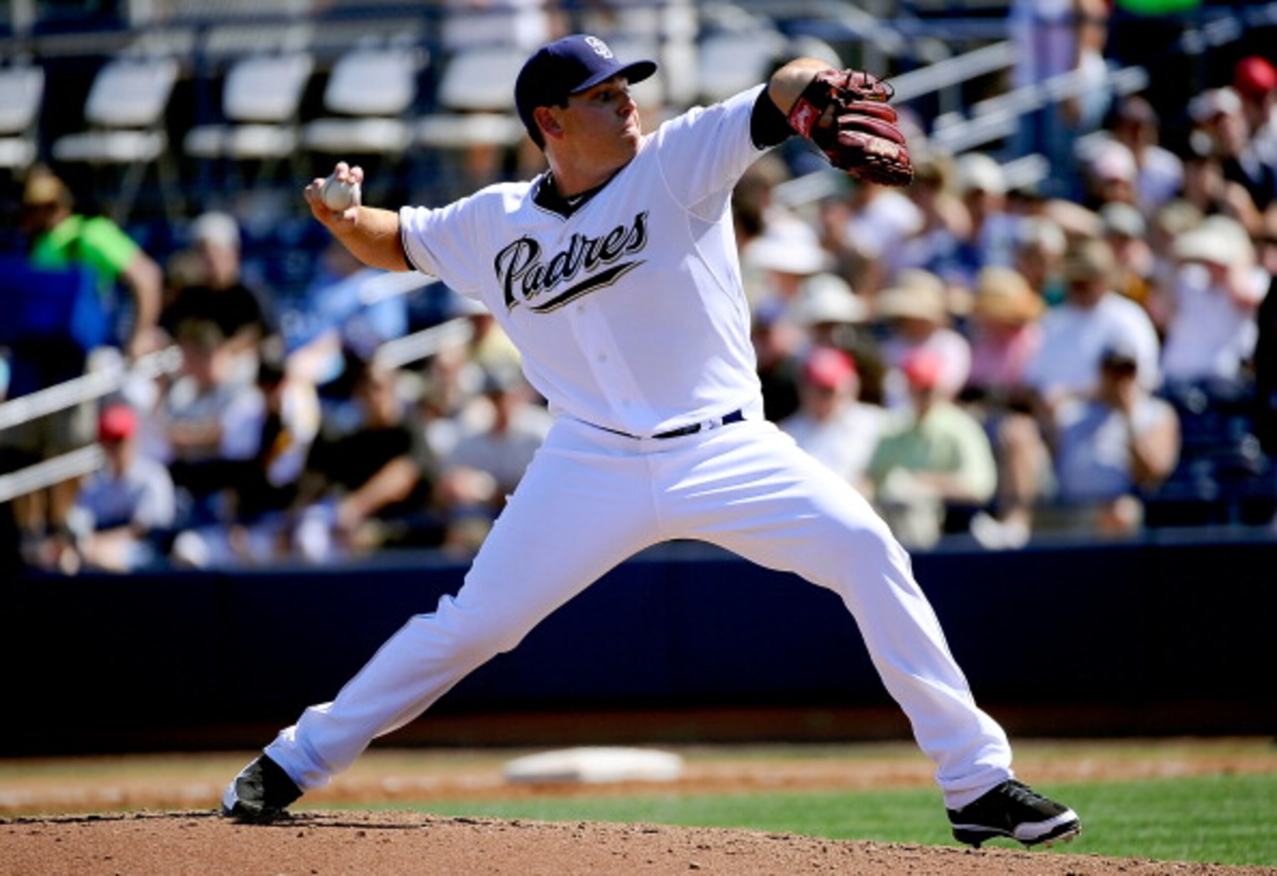 PEORIA, AZ - MARCH 13:  Pitcher Tim Stauffer #46 throws a pitch against the Cleveland Indians during the spring training baseball game at Peoria Stadium on March 13, 2011 in Peoria, Arizona.  (Photo by Kevork Djansezian/Getty Images)